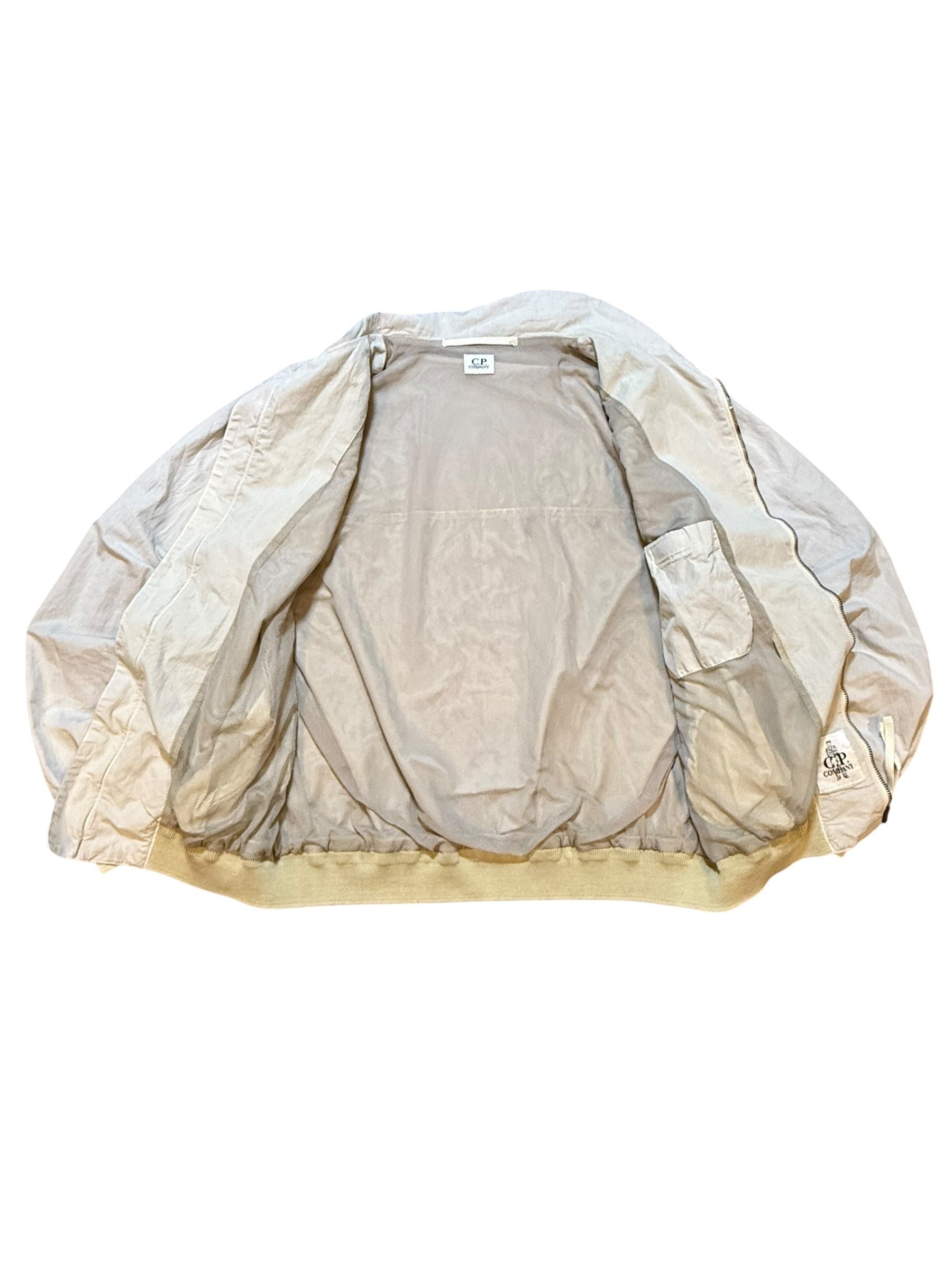 Archive No. 9 C.P. Company cream/beige bomber jacket, size Large, with dual lining and mesh interior. Vintage Italian garment.
