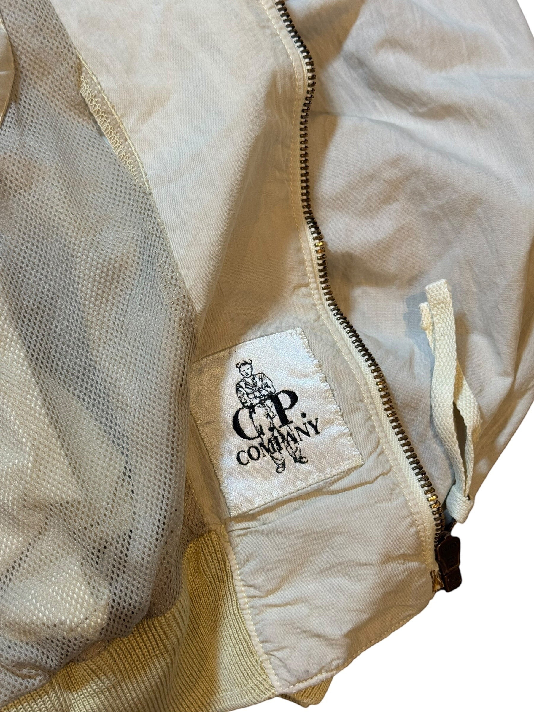 Archive No. 9 C.P. Company cream bomber jacket with mesh lining and dual lining technology. Vintage, size Large.