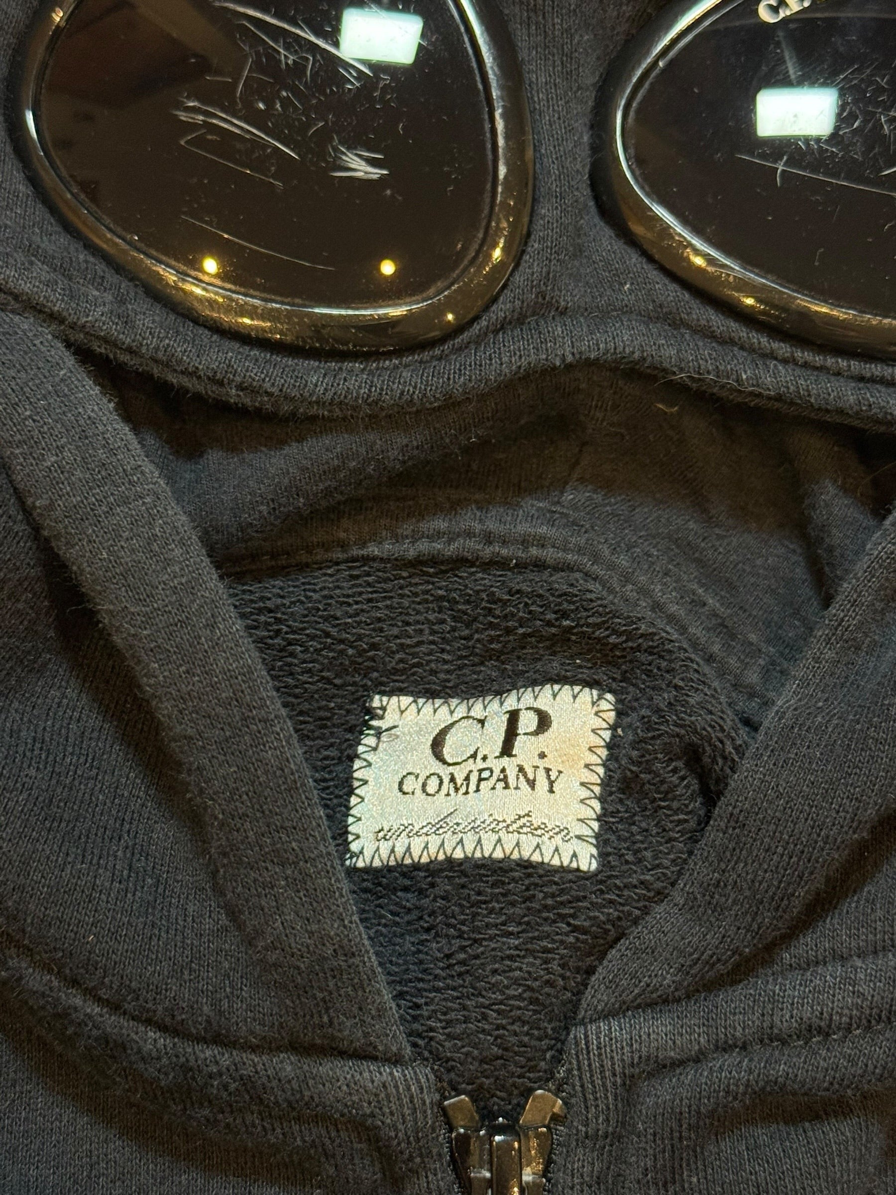 Archive No. 9 navy cotton C.P. Company hoodie with integrated goggles on the hood and front logo. Size Small.