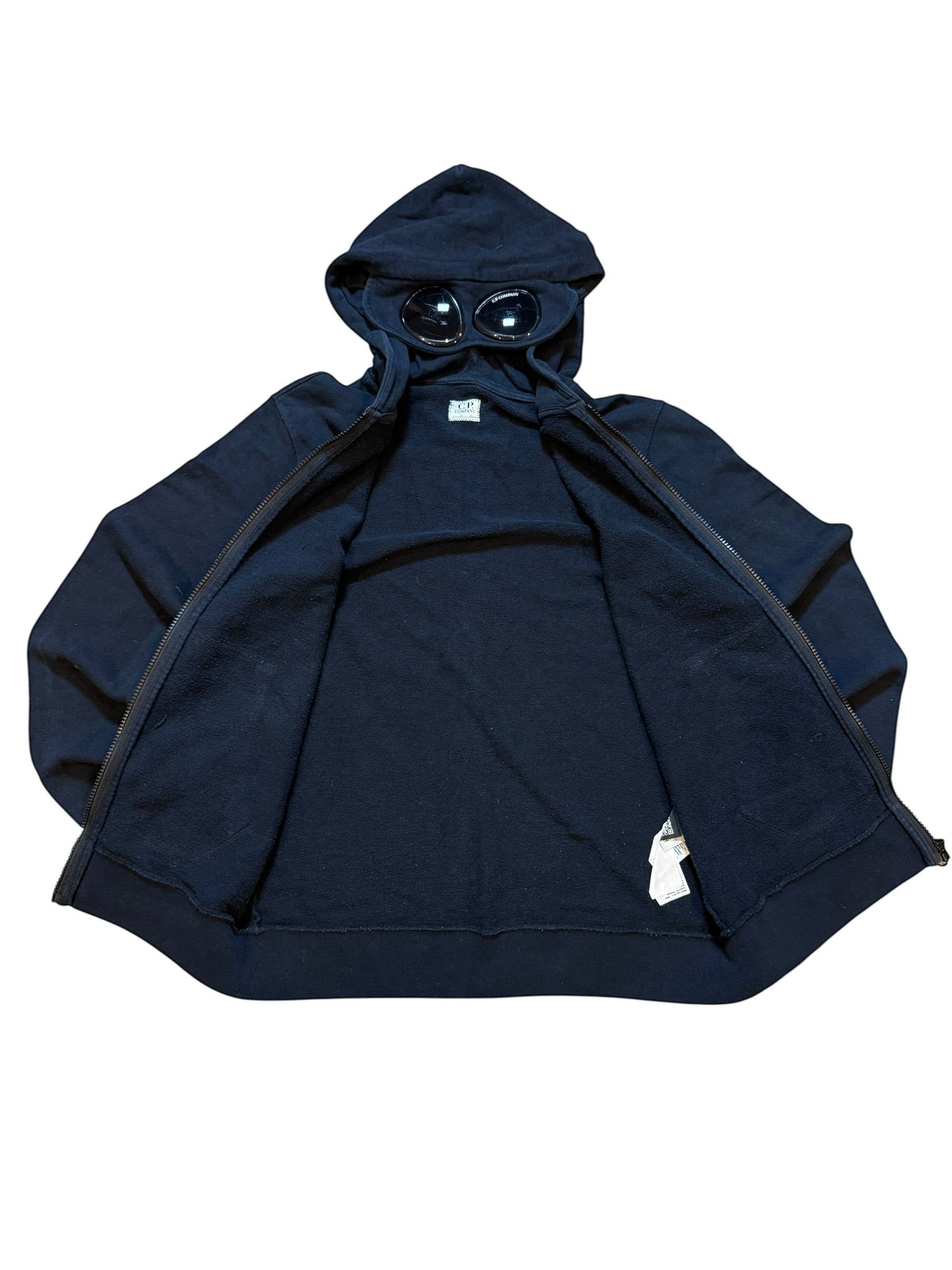Archive No. 9 navy C.P. Company zip-up hoodie with integrated goggles on the hood and fleeced interior. Size Small.