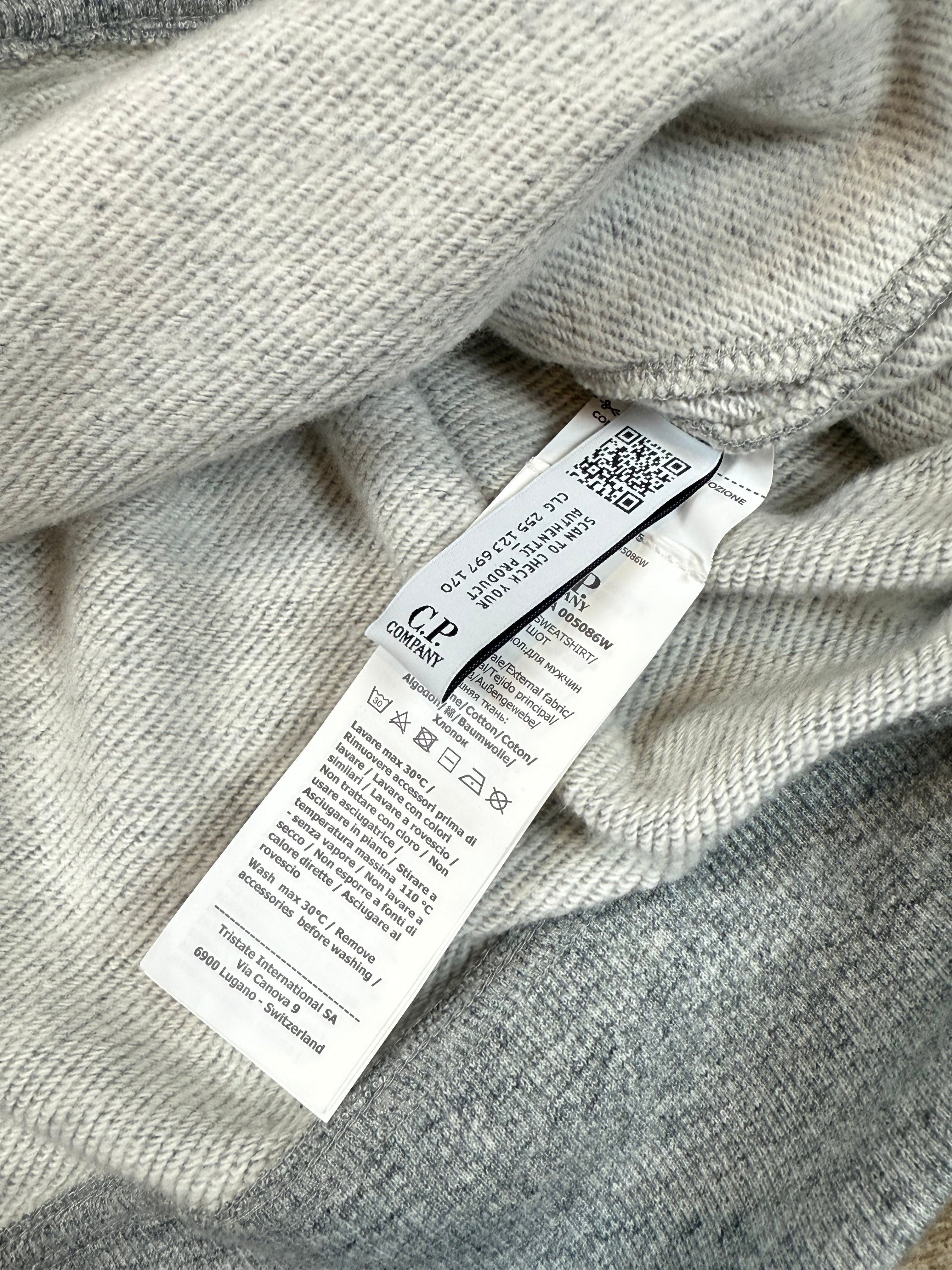 Archive No. 9 grey C.P. Company Quarter Zip jumper, size M, with iconic lens detail on the arm. Made from thick, high-quality material.
