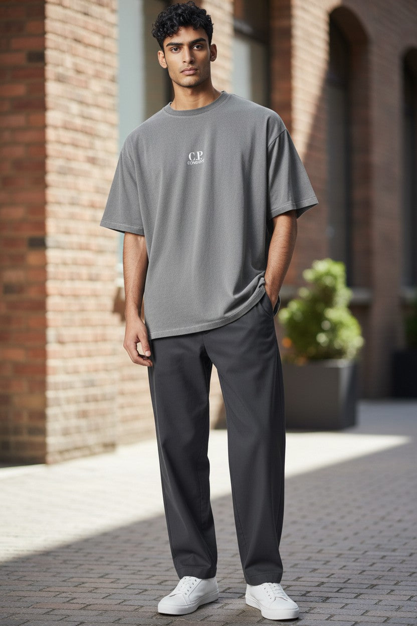 Archive No.9 vintage grey 100% cotton C.P. Company T-Shirt, size M, with subtle logo detail.