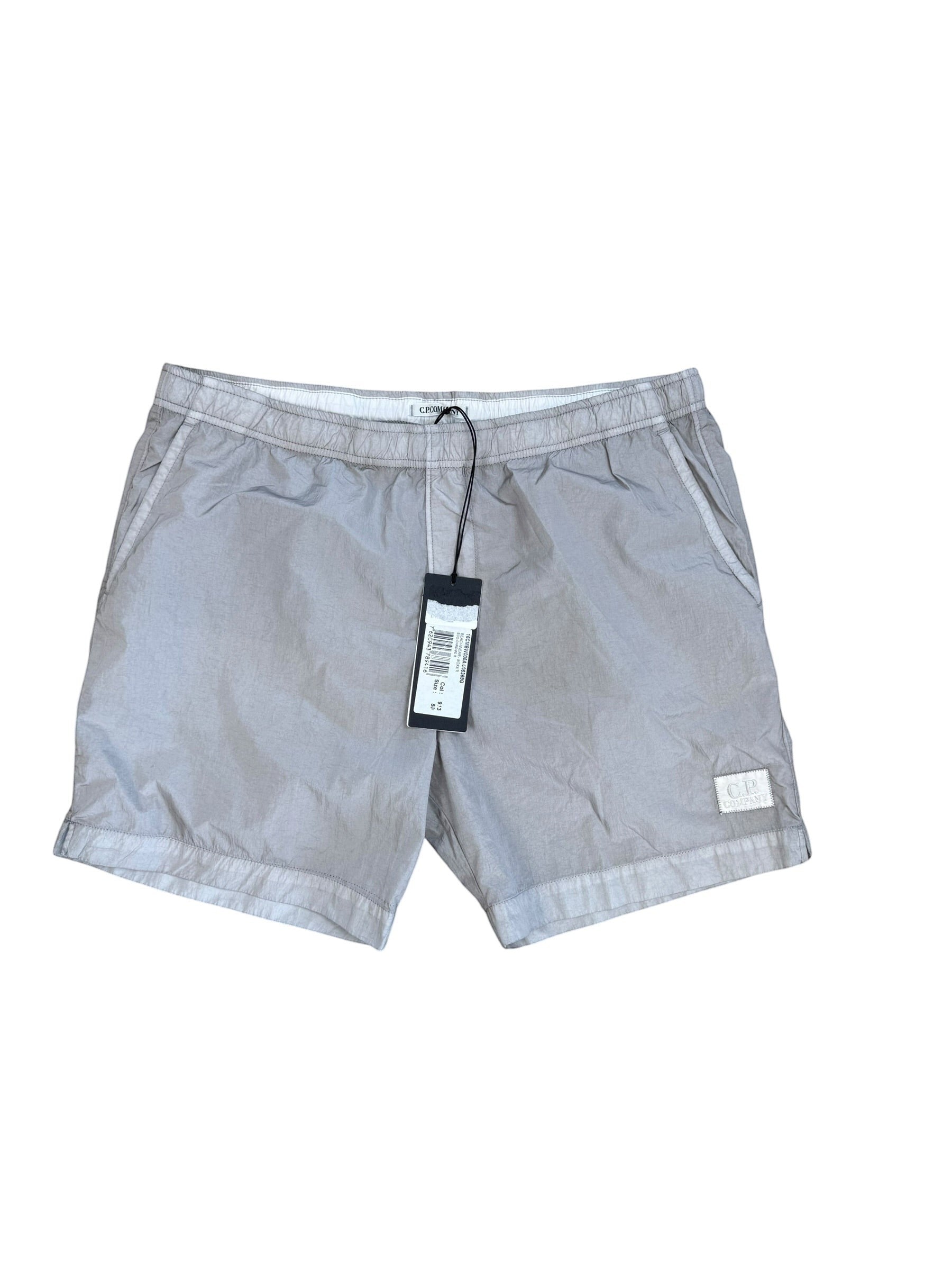 Archive No. 9 C.P. Company grey Chrome-R waterproof shorts with mesh lining and logo patch. Size L / W34.