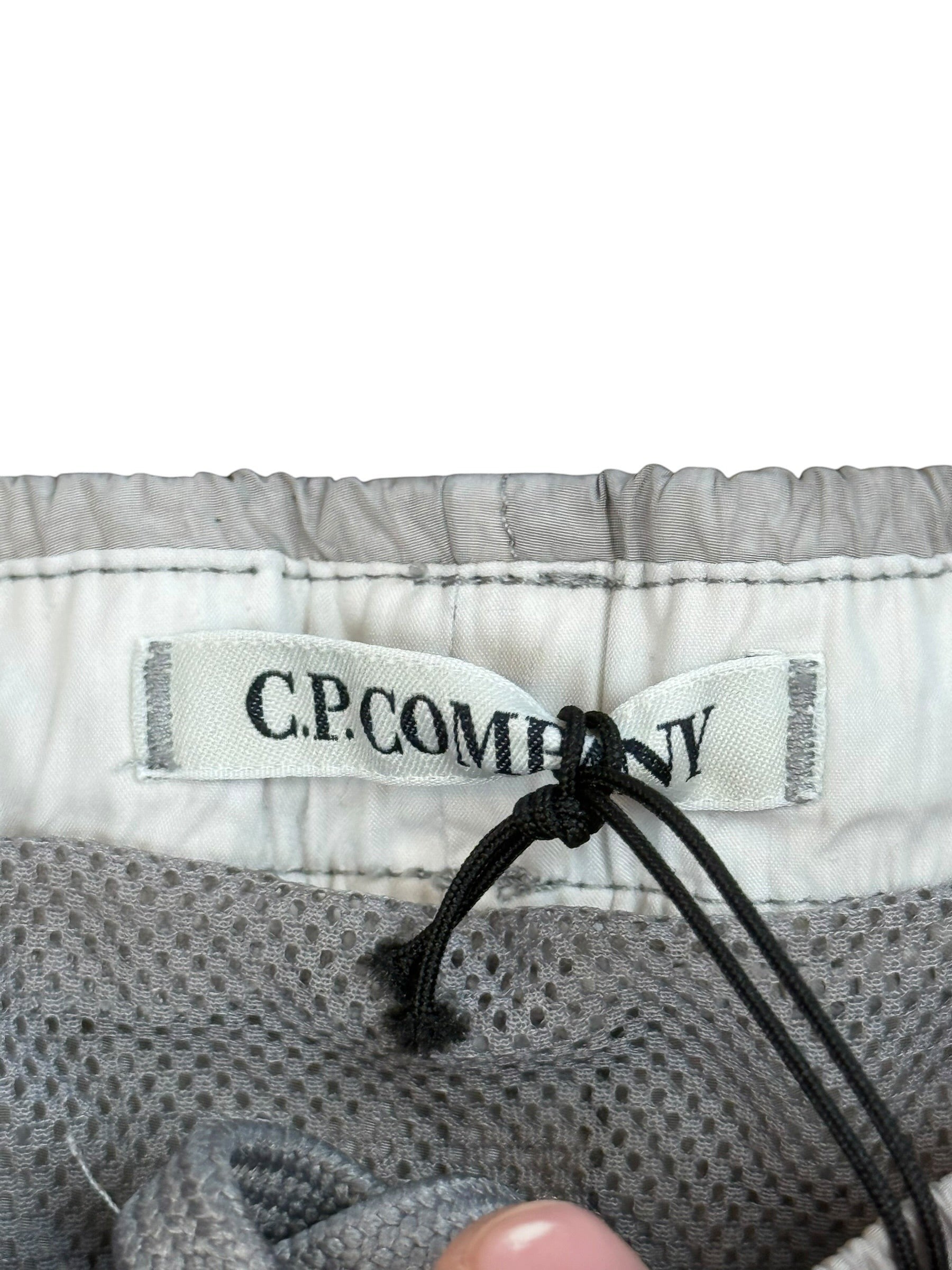 Archive No. 9 C.P. Company grey shorts with mesh lining and waterproof Chrome-R technology.