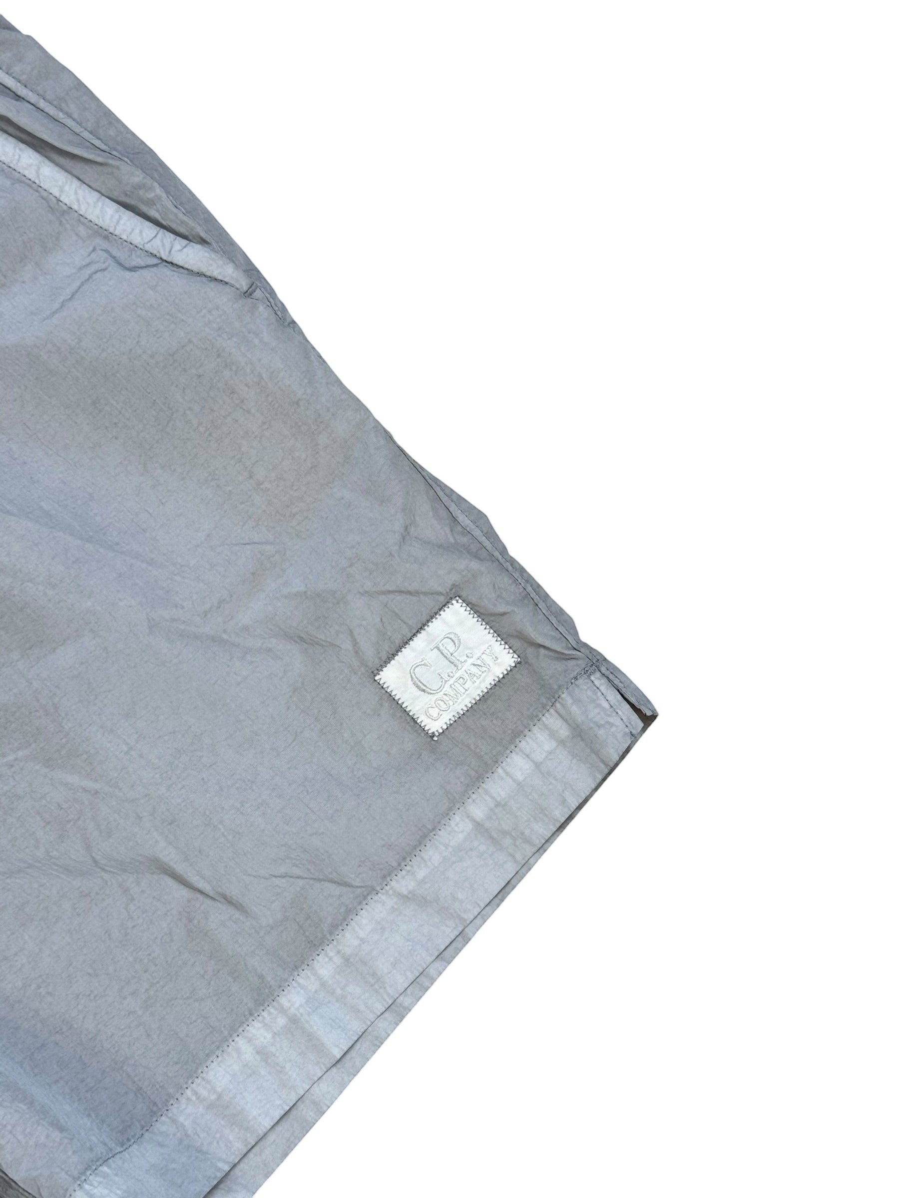 Archive No. 9 C.P. Company grey Chrome-R shorts with waterproof protection and mesh lining. Size L.
