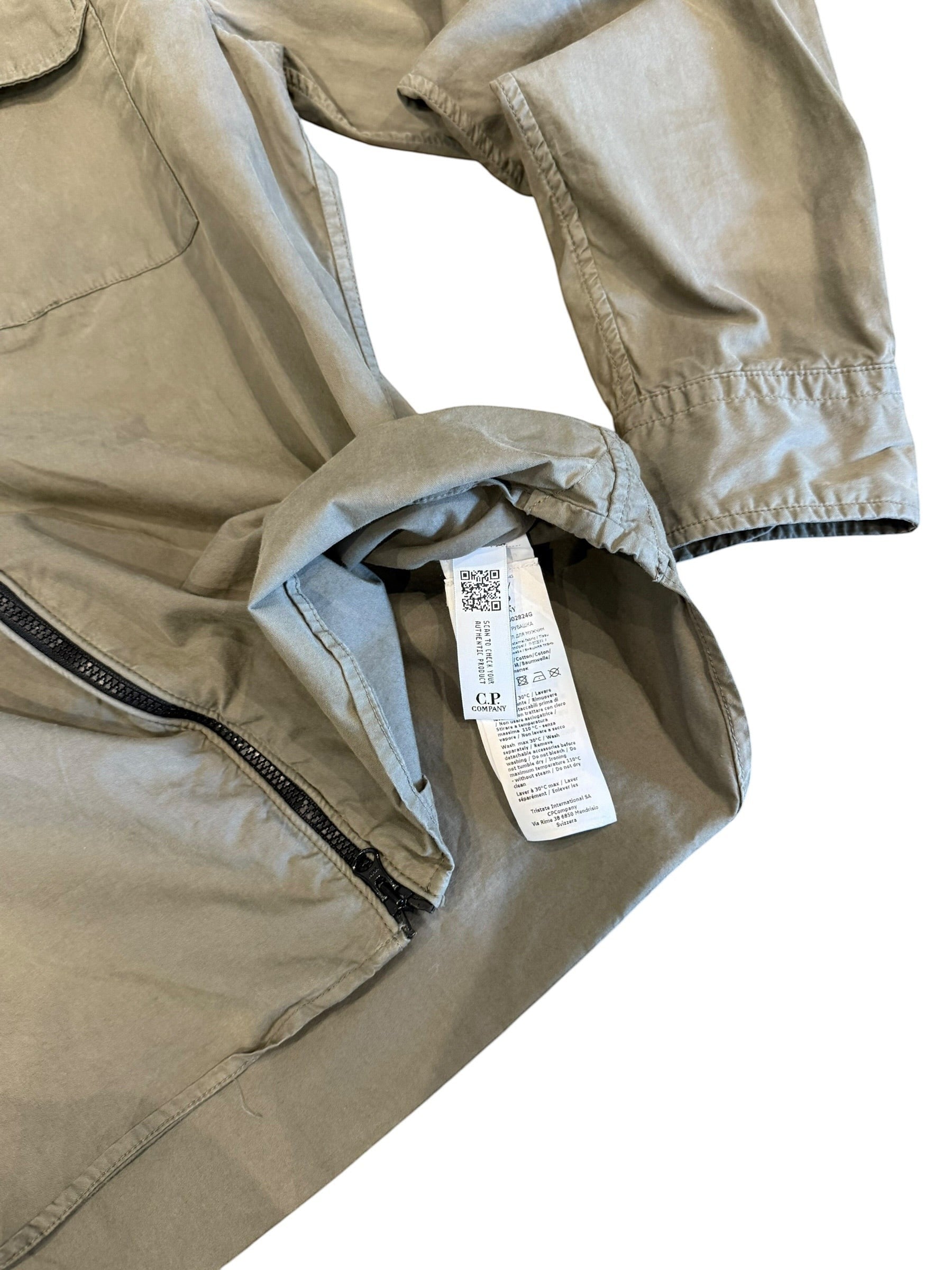Archive No. 9 C.P. Company khaki lightweight zip-up overshirt with iconic arm lens, size Medium.