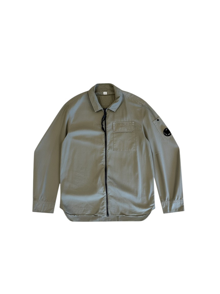 Archive No. 9 khaki C.P. Company lightweight zip-up overshirt with iconic arm lens, size Medium.