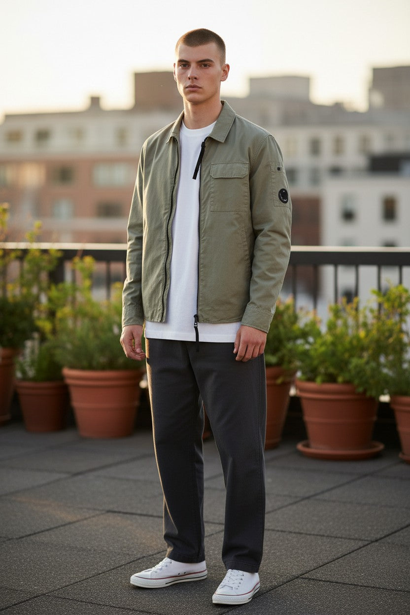 Archive No. 9 C.P. Company khaki lightweight zip-up overshirt with iconic arm lens, size Medium.