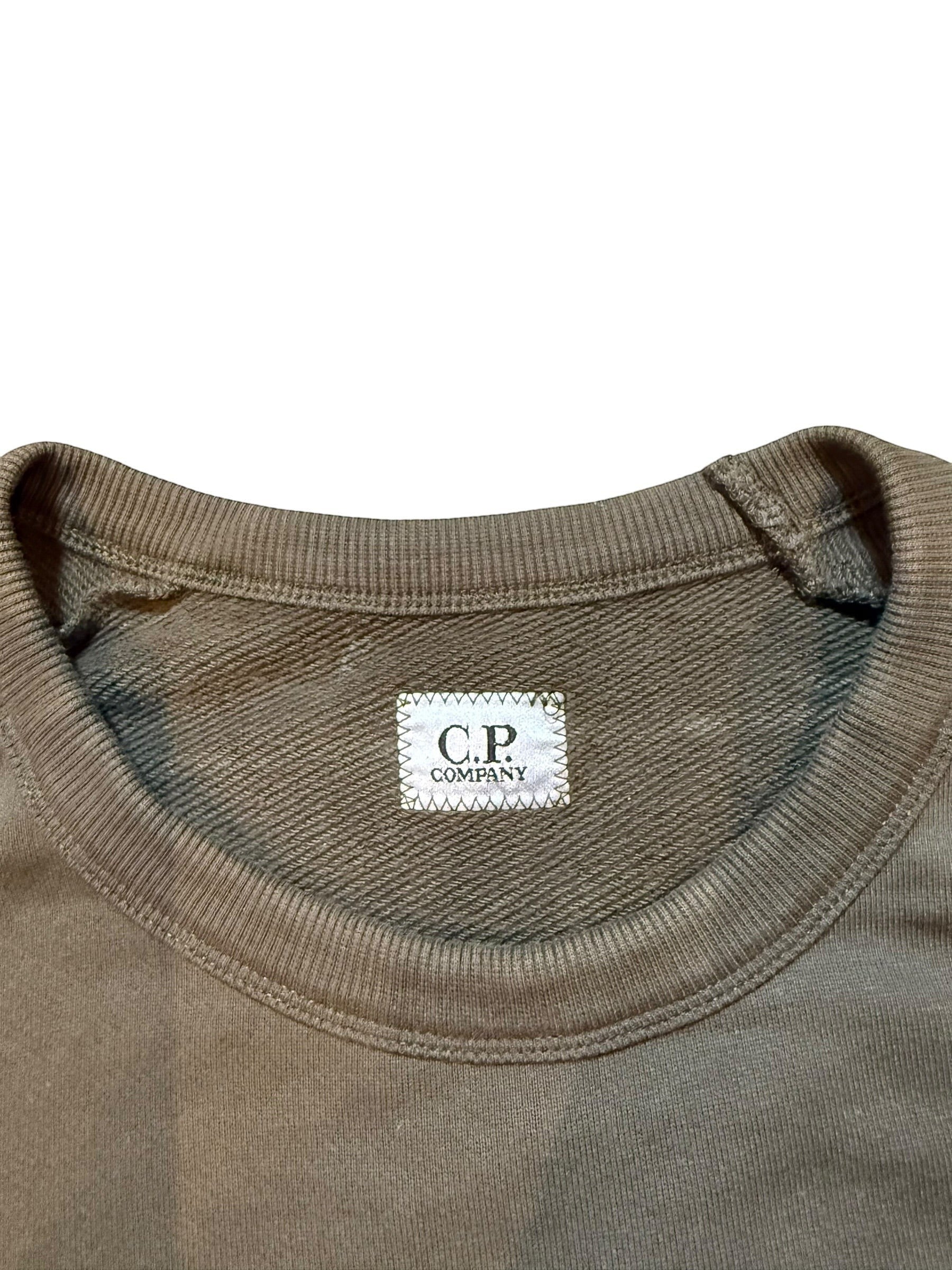 Archive No. 9 C.P. Company khaki Crew Neck sweatshirt, size Medium, made from thick cotton with front pockets and iconic arm lens.