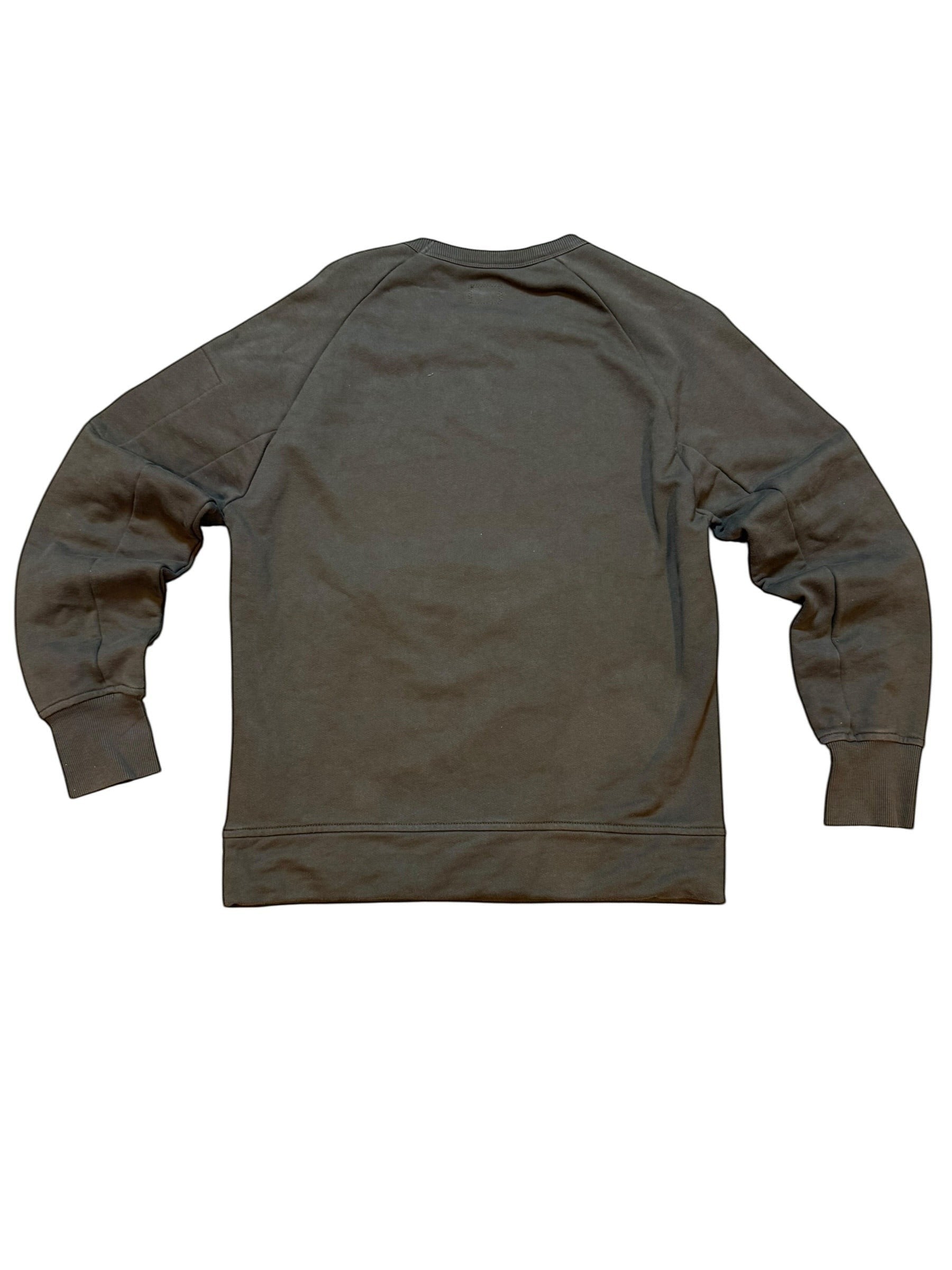 Archive No. 9 khaki C.P. Company sweatshirt with lens detail on arm and two front pockets. Made in Italy.