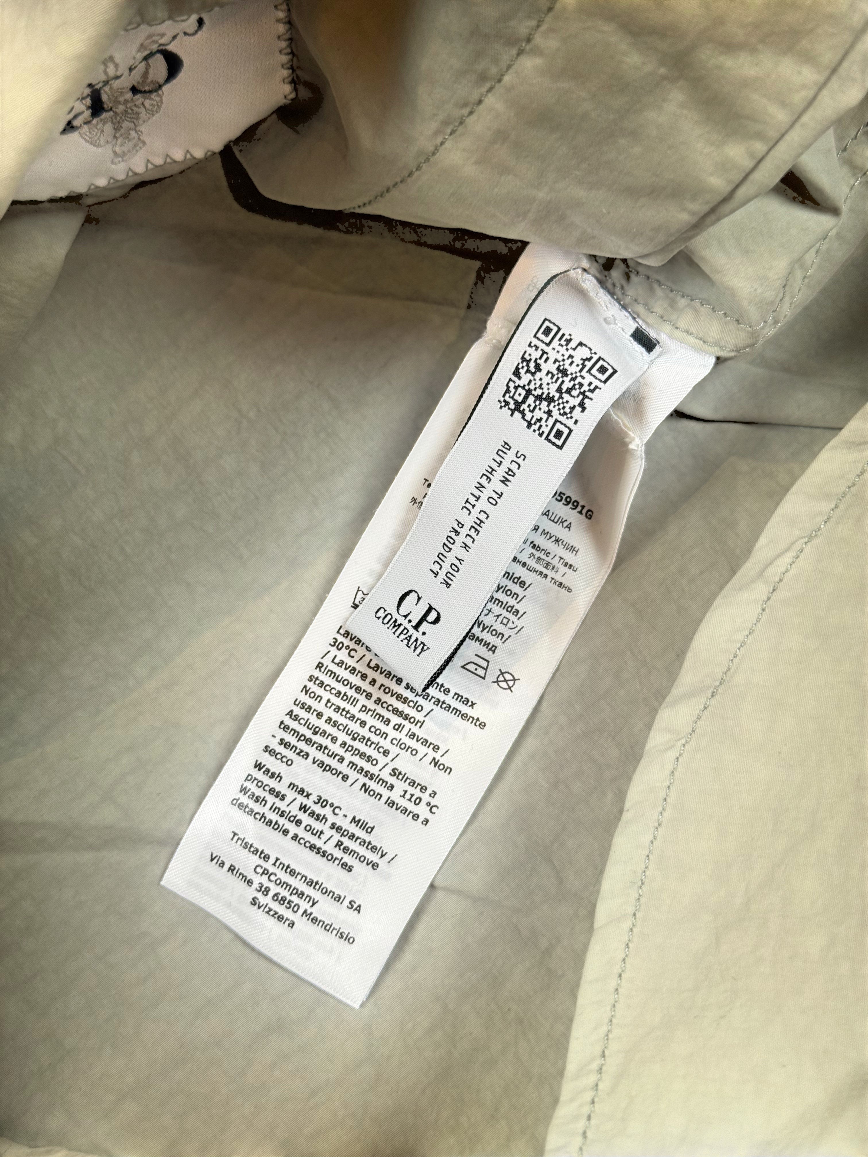 Archive No. 9 C.P. Company khaki utility overshirt, size S, lightweight, breathable, multiple pockets.