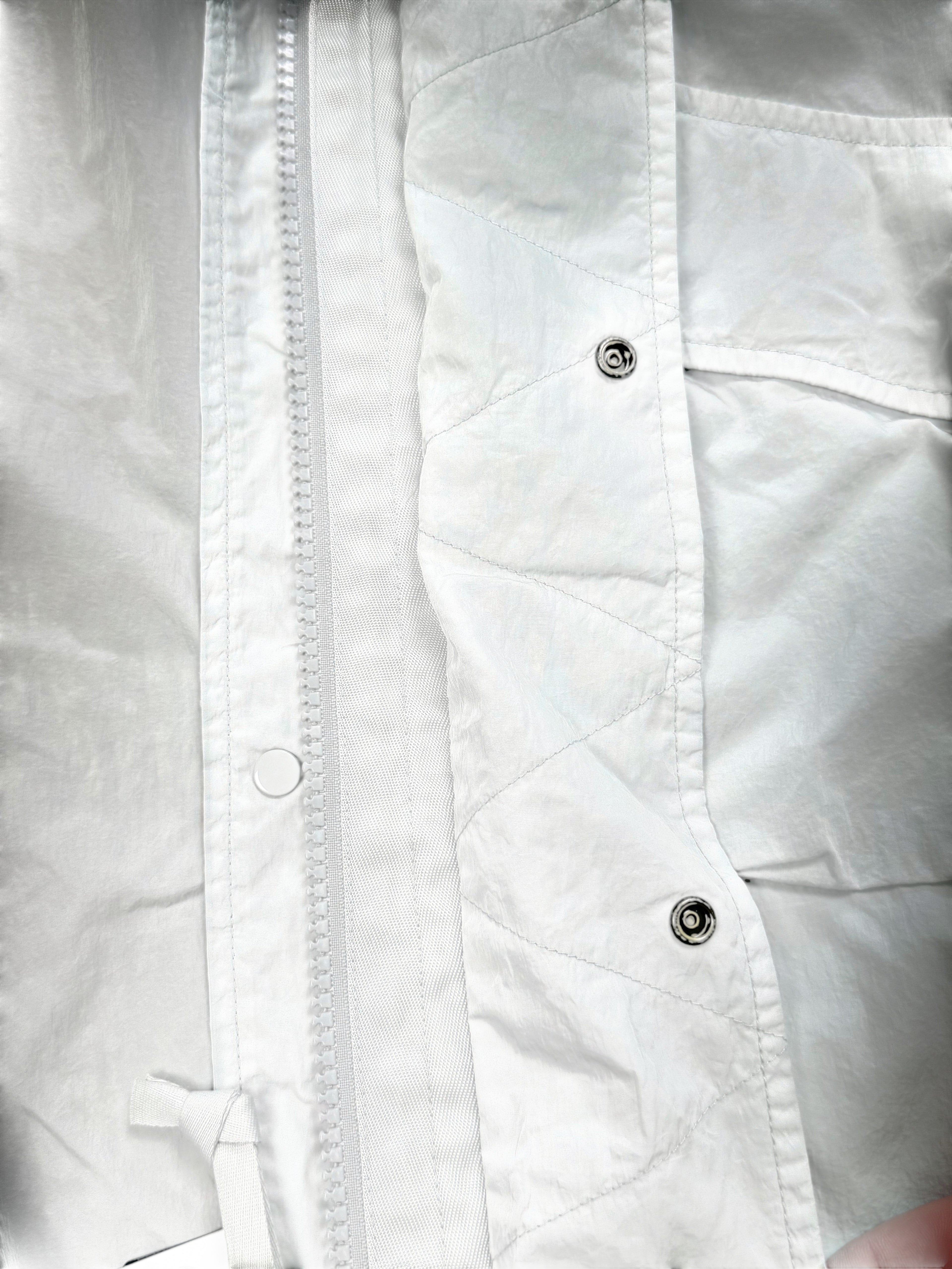 Archive No. 9 C.P. Company light blue Chrome R Utlity Windbreaker jacket, size L. Features a zip closure and snap buttons.