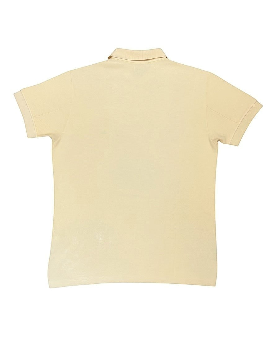 Archive No. 9 vintage C.P. Company mustard yellow polo shirt, size L, made in Italy. Classic short-sleeve design.