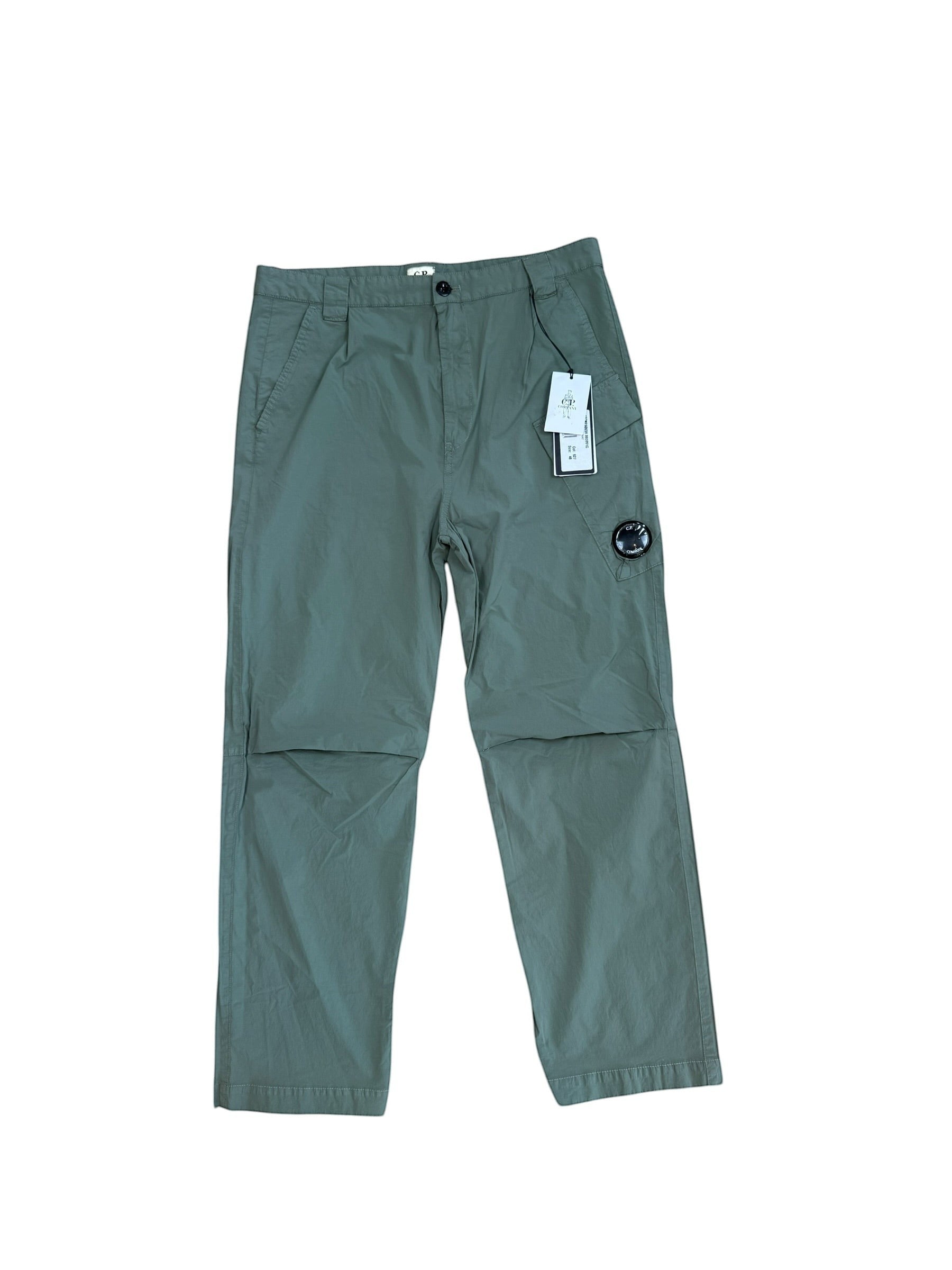 Archive No. 9 C.P. Company dark turquoise nylon lightweight baggy fit trousers with iconic lens detail. W32.
