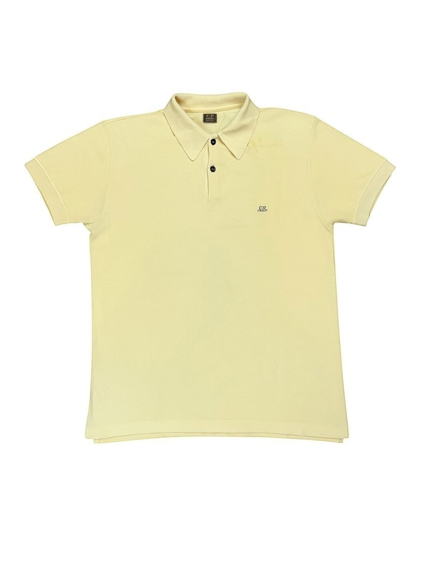 Archive No. 9 vintage C.P. Company mustard yellow cotton polo shirt, size L, made in Italy.