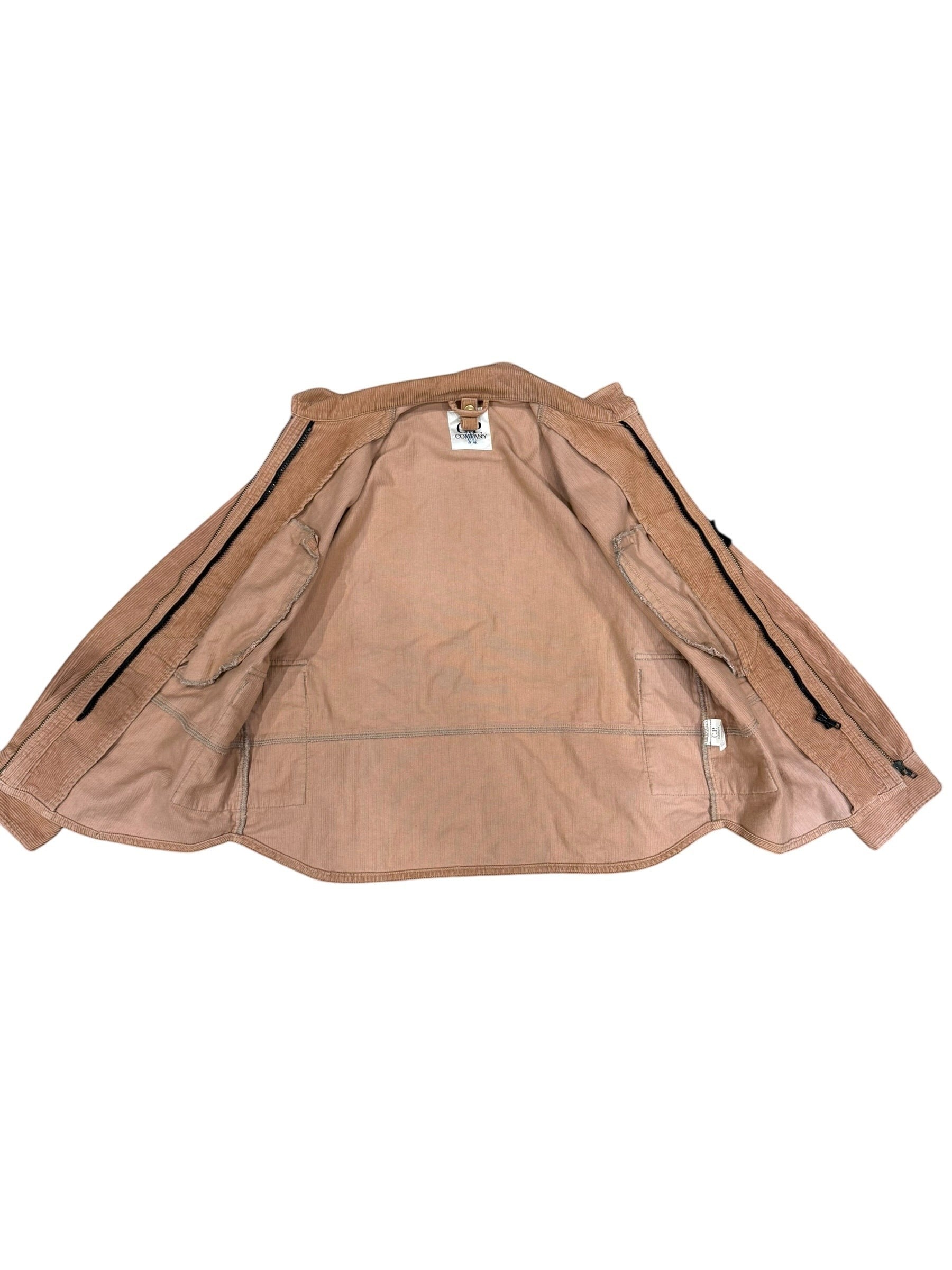 Archive No. 9 vintage C.P. Company pink corduroy jacket, size Small. Textured, structured outerwear with a clean silhouette.