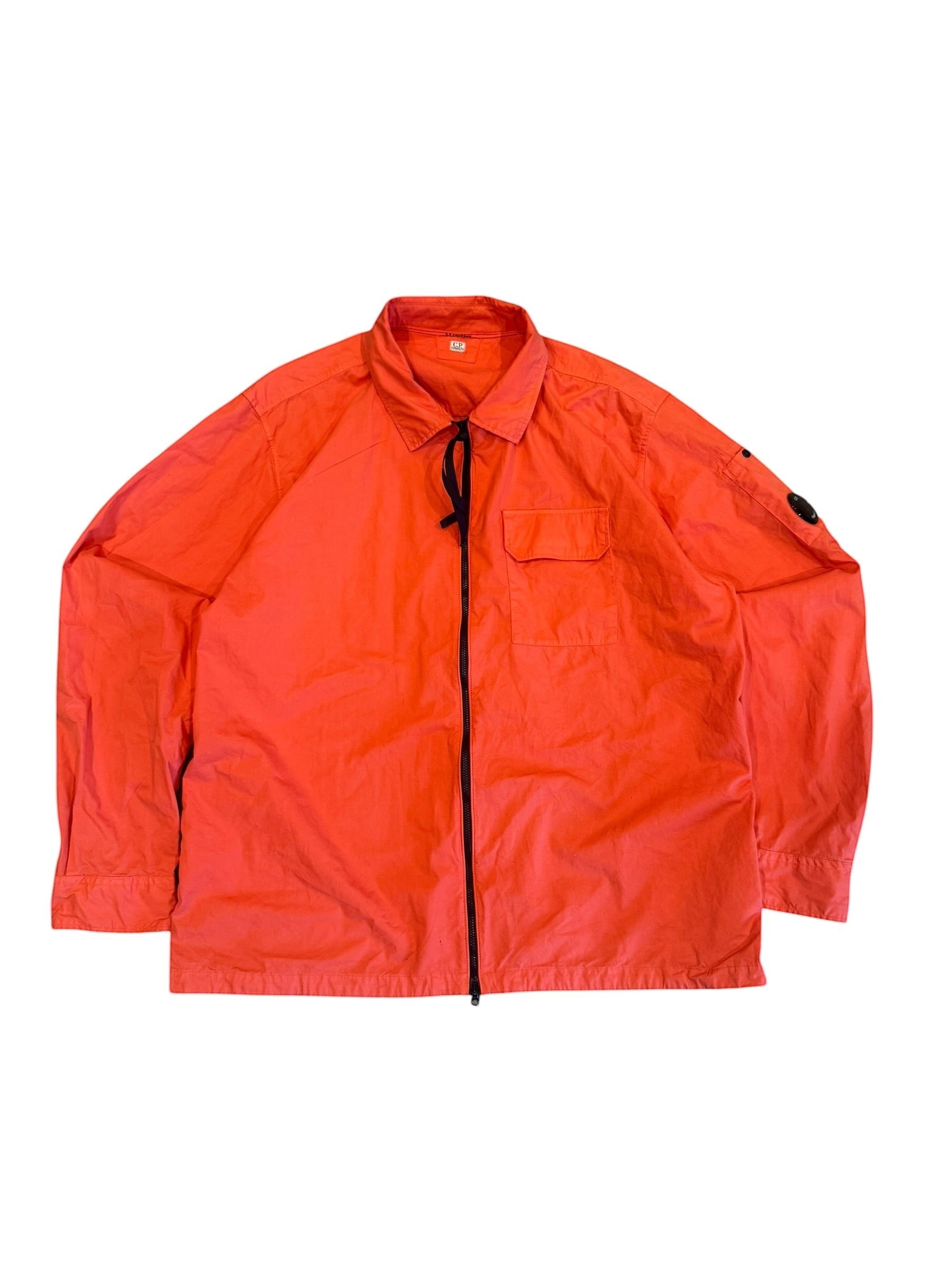 Archive No. 9 C.P. Company red lightweight overshirt with zip closure and iconic arm lens, size XXL.
