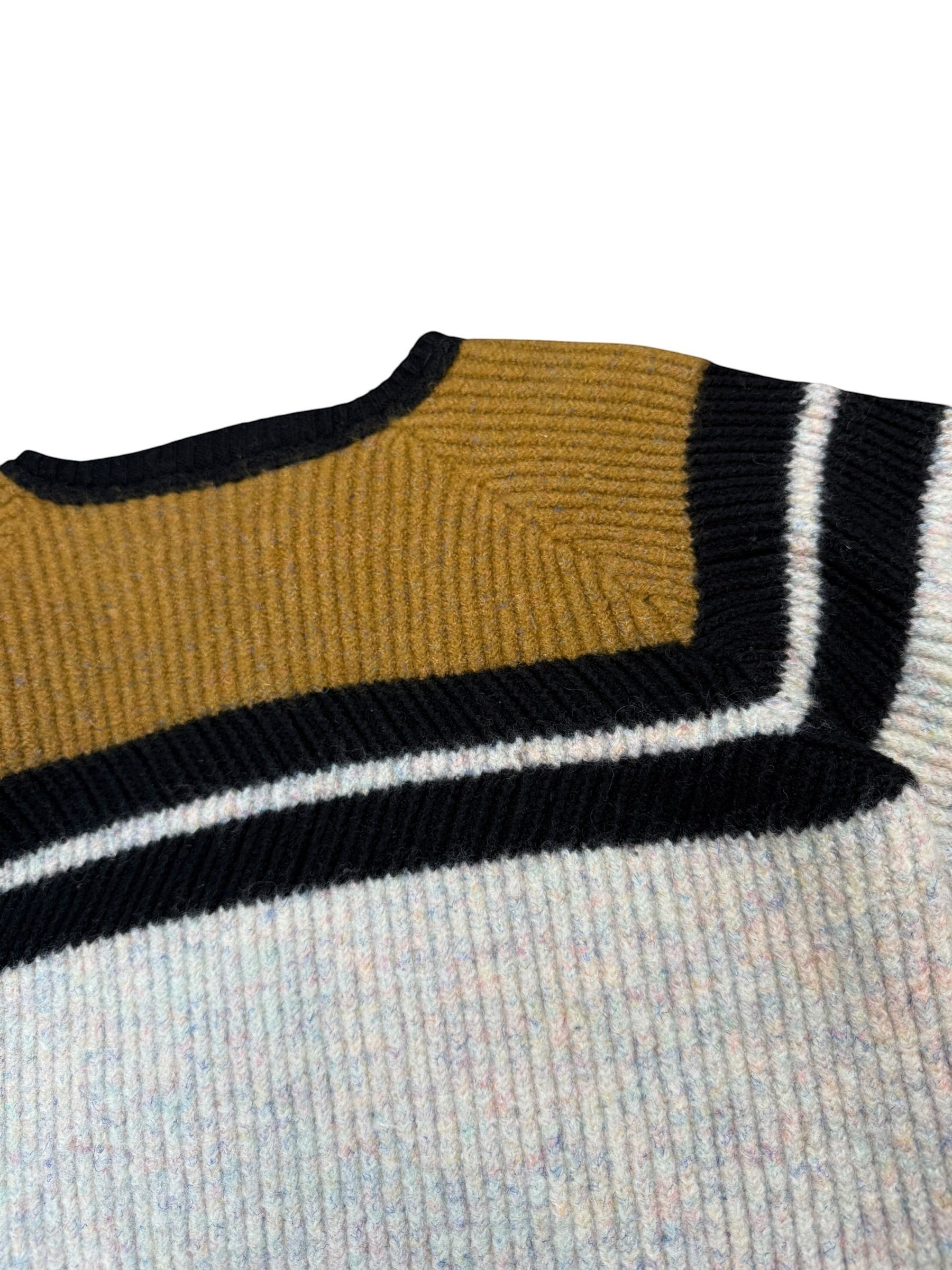 Archive No. 9 vintage C.P. Company knit jumper in beige, tan, and brown with black and white stripes. Soft knit construction, crew neck.