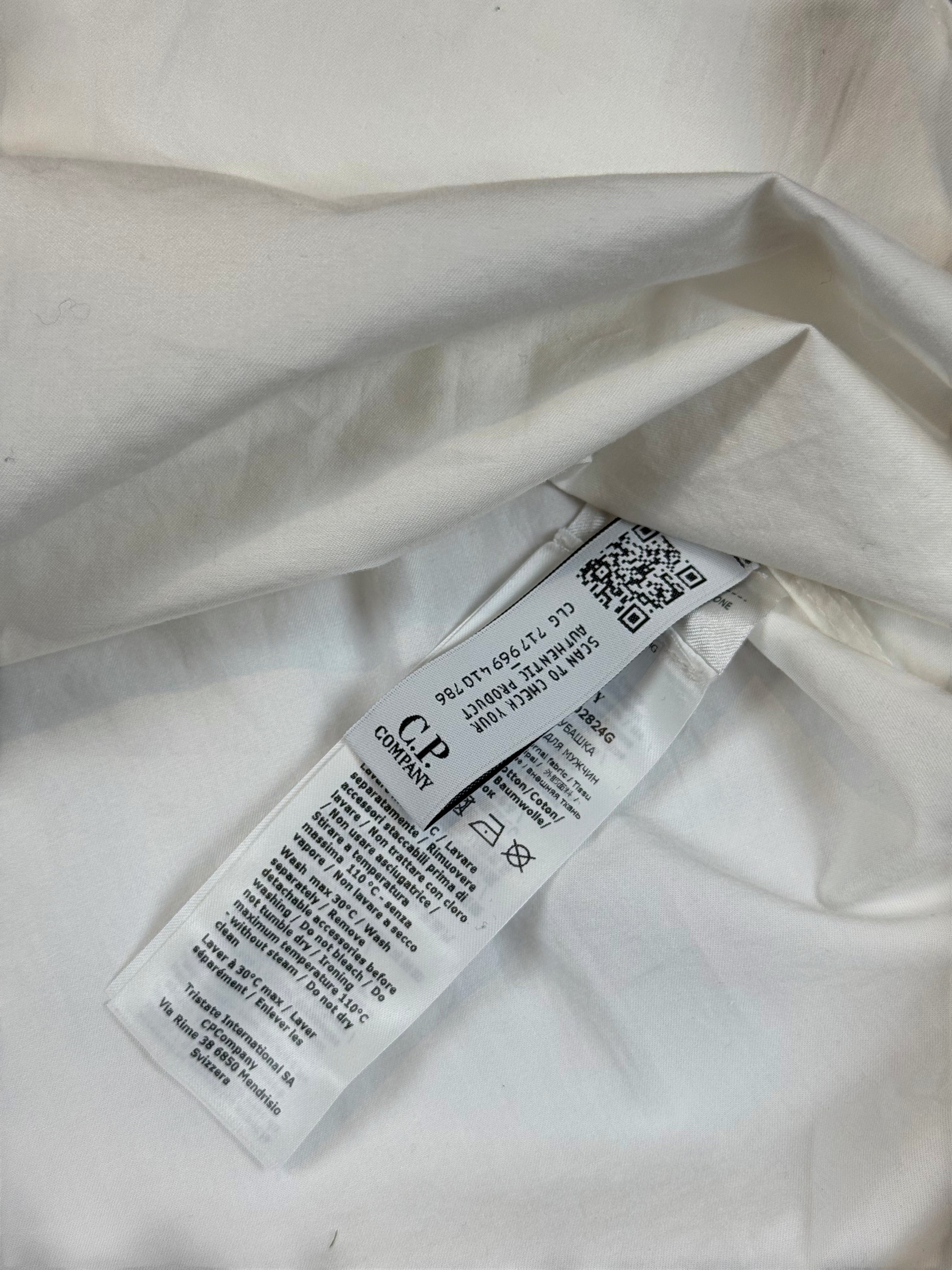 Archive No. 9 C.P. Company white lightweight zip-up overshirt, size L, with iconic arm lens detail.