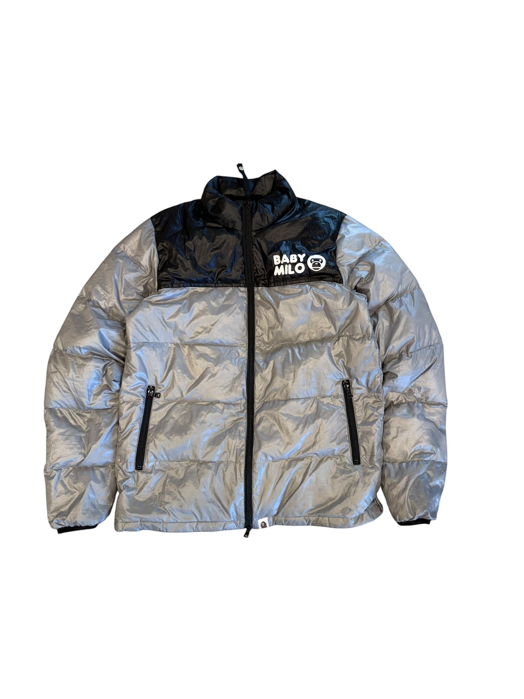 Archive No. 9 grey and black down-filled puffer jacket with Baby Milo logo, size Small. Lightweight and wind-resistant.