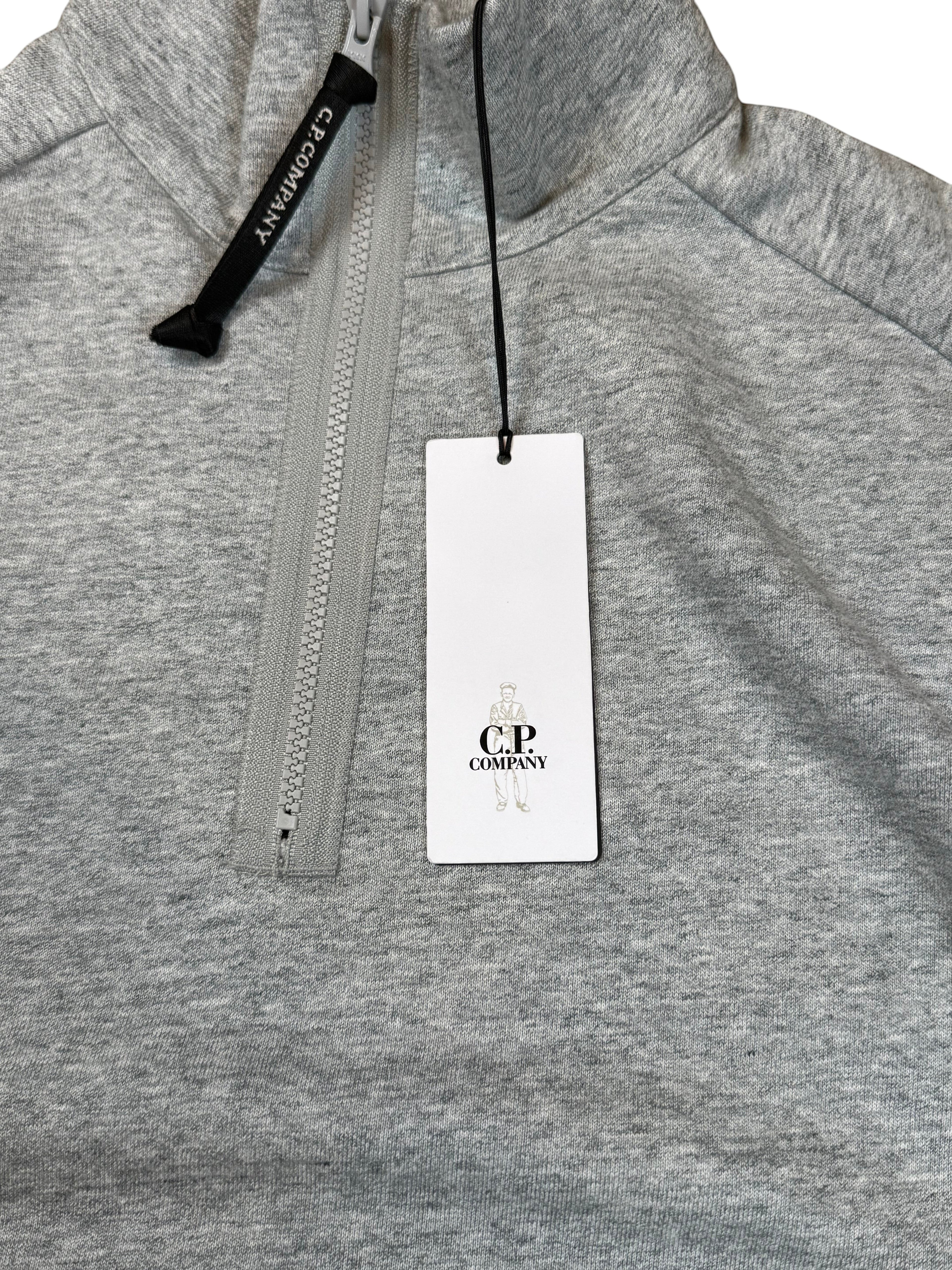 Archive No. 9 grey C.P. Company Quarter Zip jumper in medium, featuring a thick cotton blend and iconic lens detail on the arm.