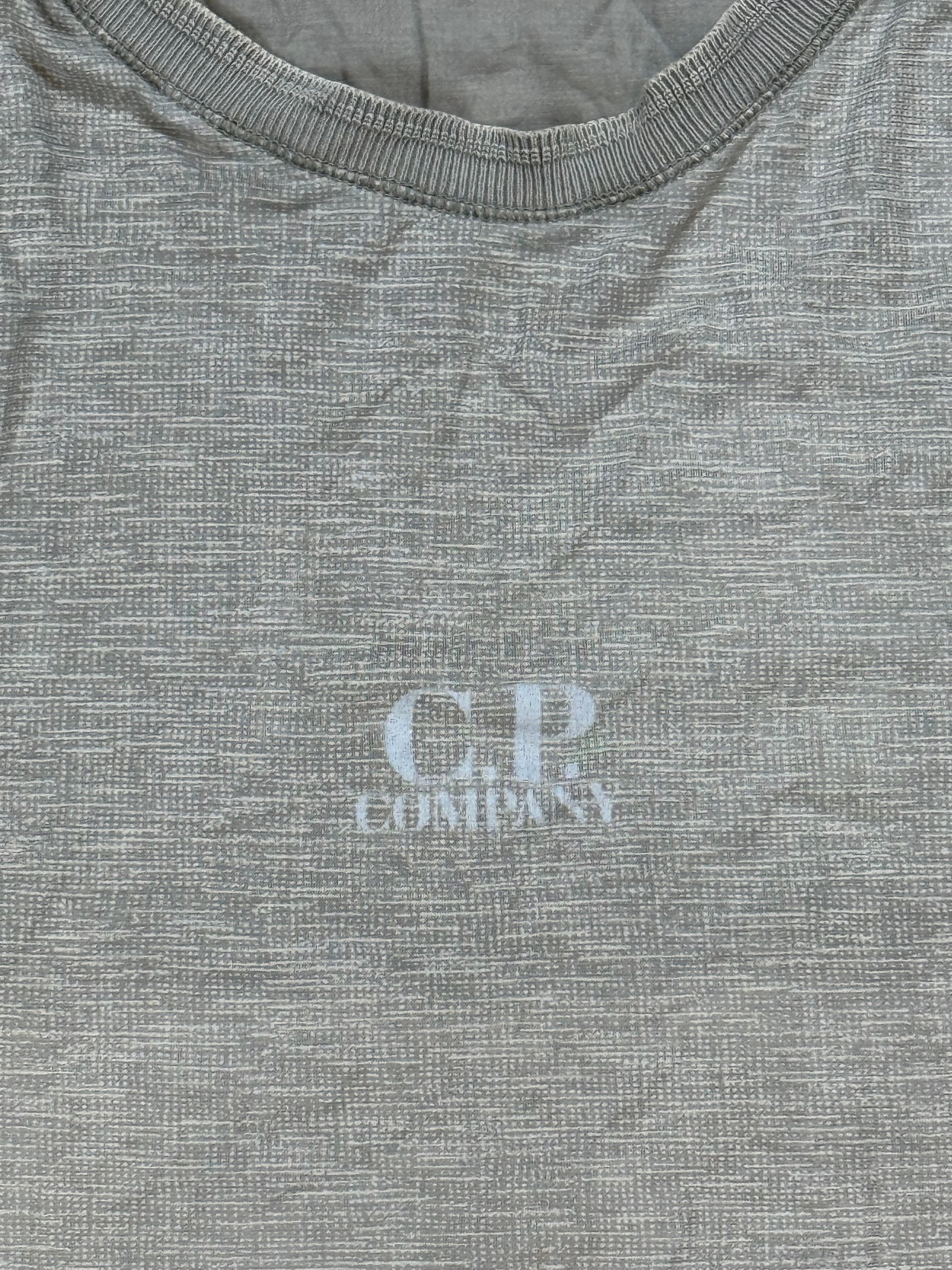 Archive No. 9 grey C.P. Company t-shirt with muscle fit and subtle textured pattern. Faded logo on chest.