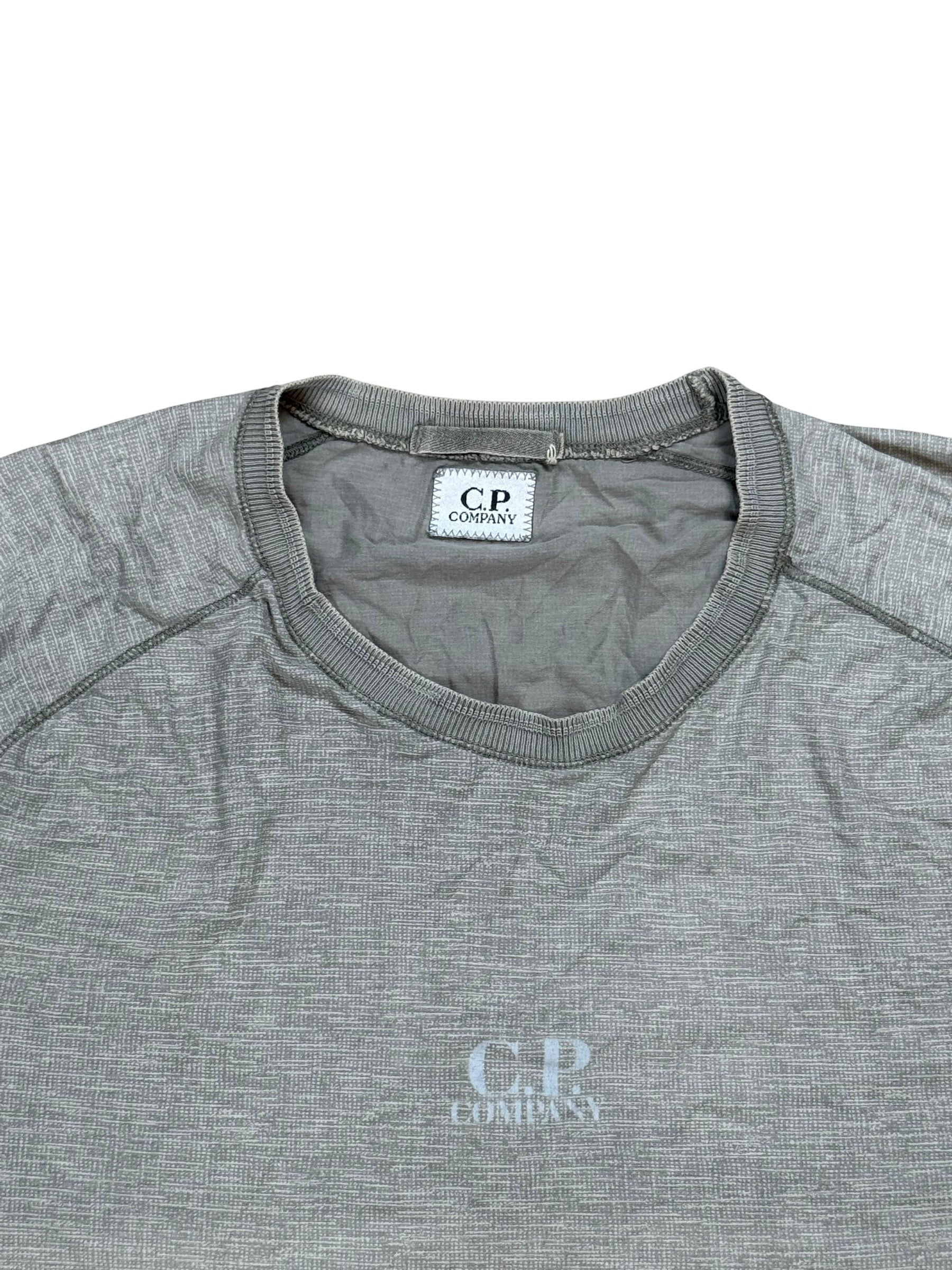 Archive No. 9 grey C.P. Company t-shirt with muscle fit and subtle chest logo. Lightweight, breathable material.