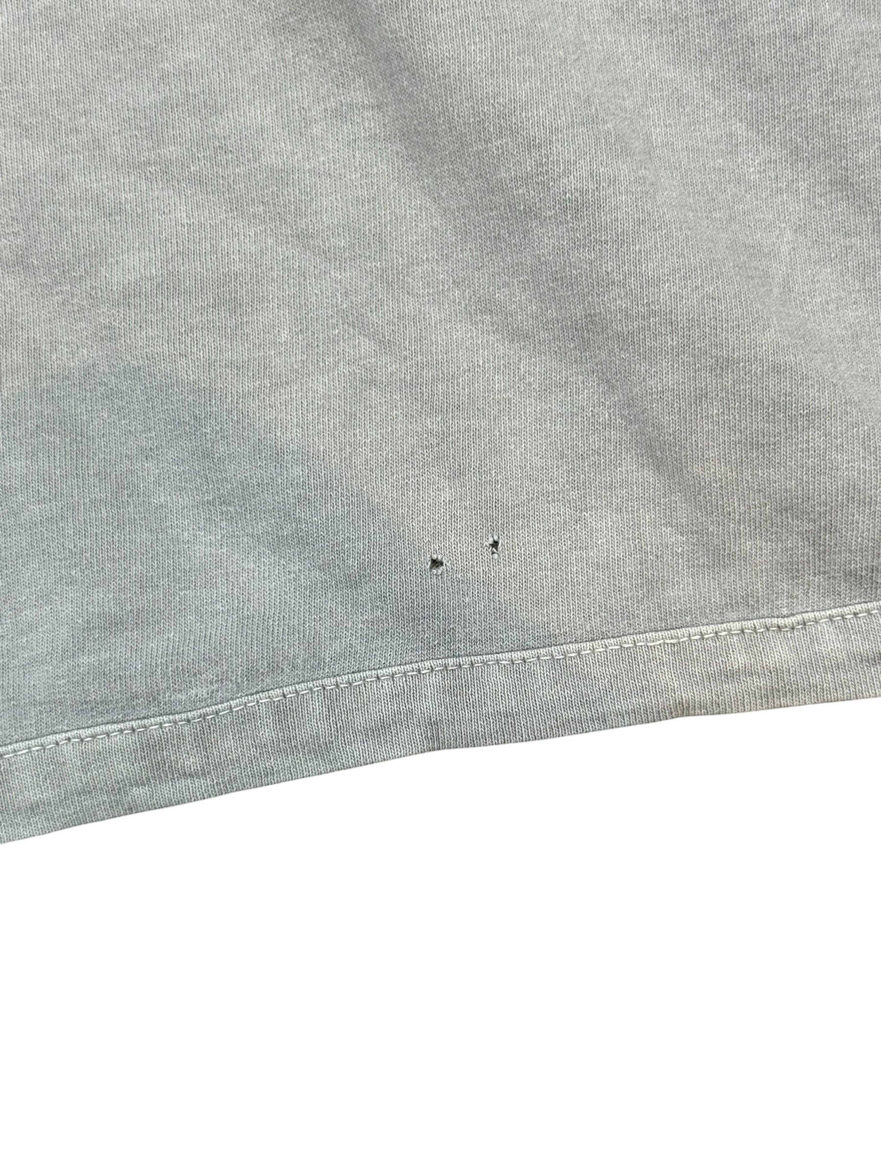 Archive No. 9 vintage grey 100% cotton Stone Island t-shirt with embroidered logo, size L. Features slight discolouration and two small holes.