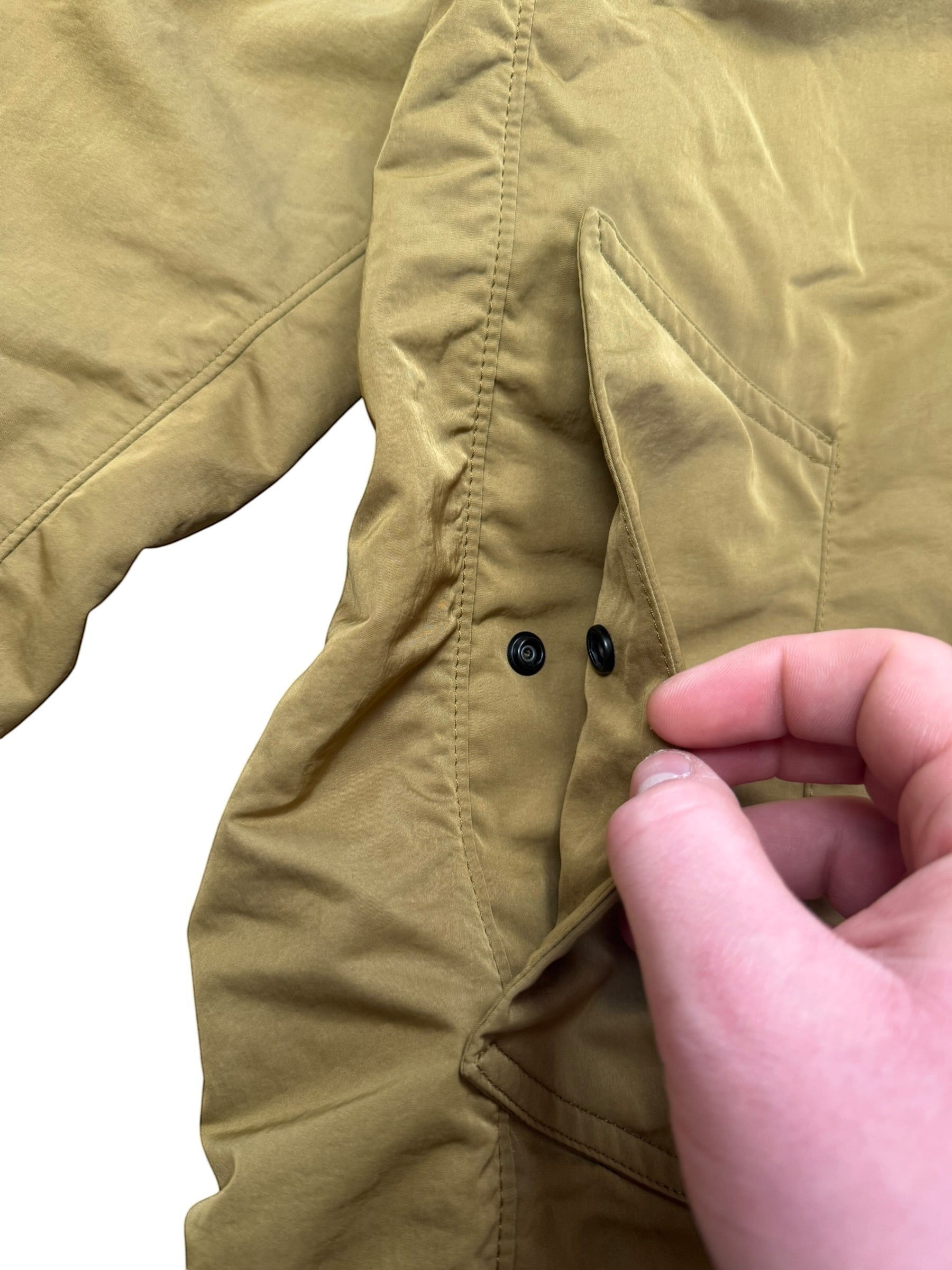 Archive No. 9 khaki Stone Island Hyper Dense Nylon Raso windbreaker jacket with snap closure pockets.
