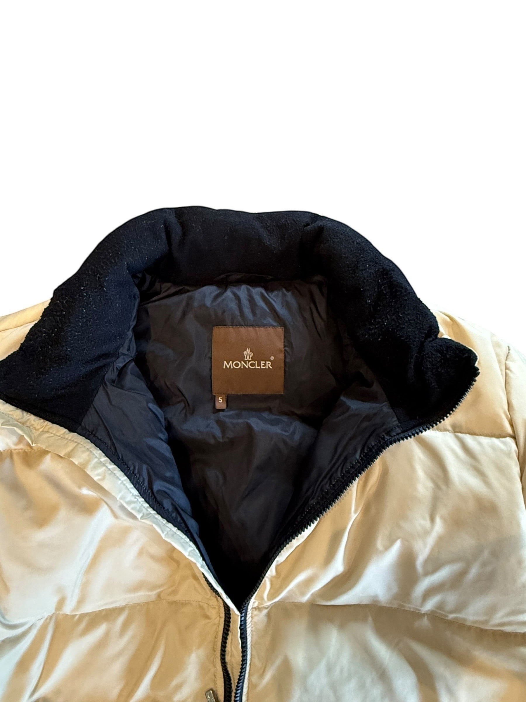 Archive No. 9 Moncler vintage beige down puffer jacket with hidden hood and black collar detail. Size Large.