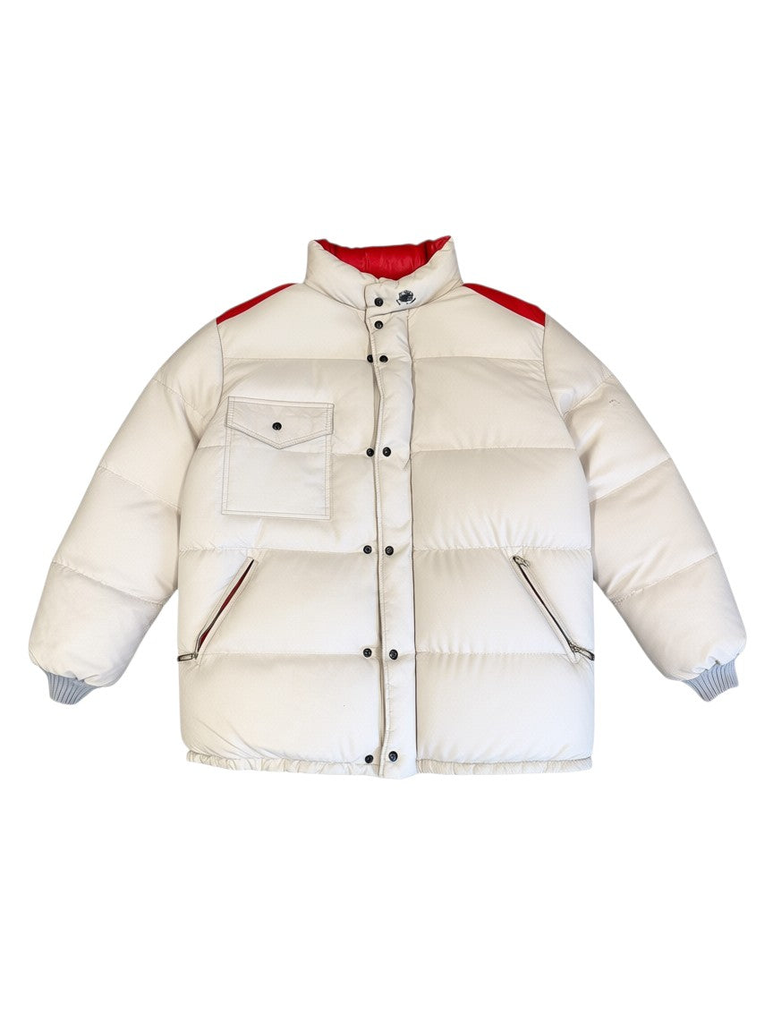 Archive No. 9 1990s Moncler beige down-filled puffer jacket with red collar lining and shoulder accents. Size L.