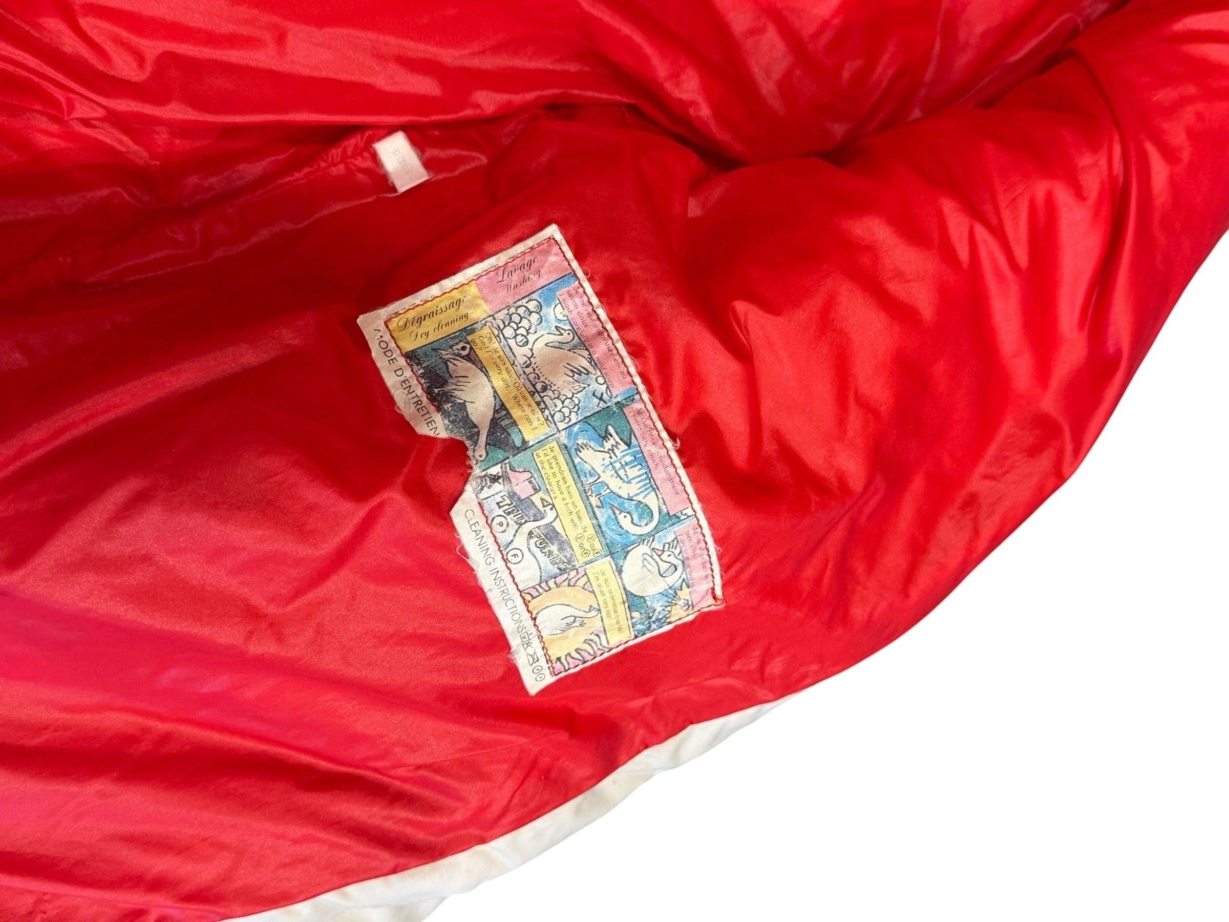 Archive No. 9 1990s Moncler beige down-filled puffer jacket with red lining and stowable hood.
