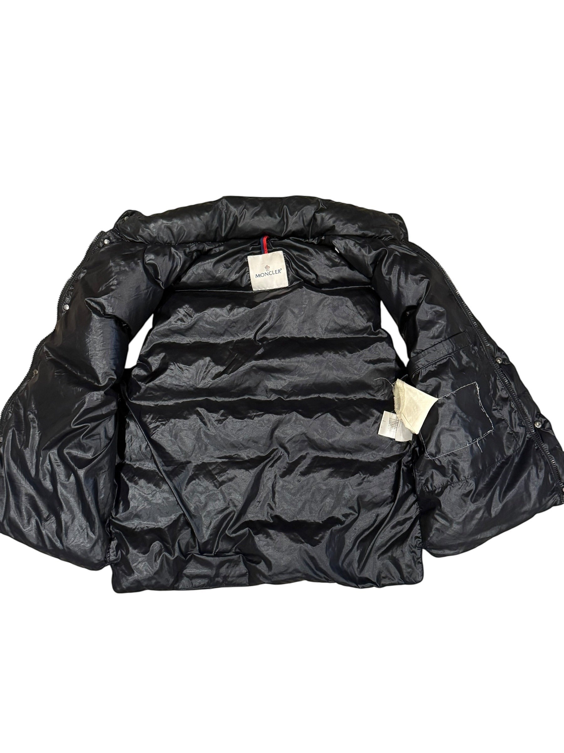 Archive No.9 Moncler black down-filled body warmer, size Medium, with iconic chest badge.