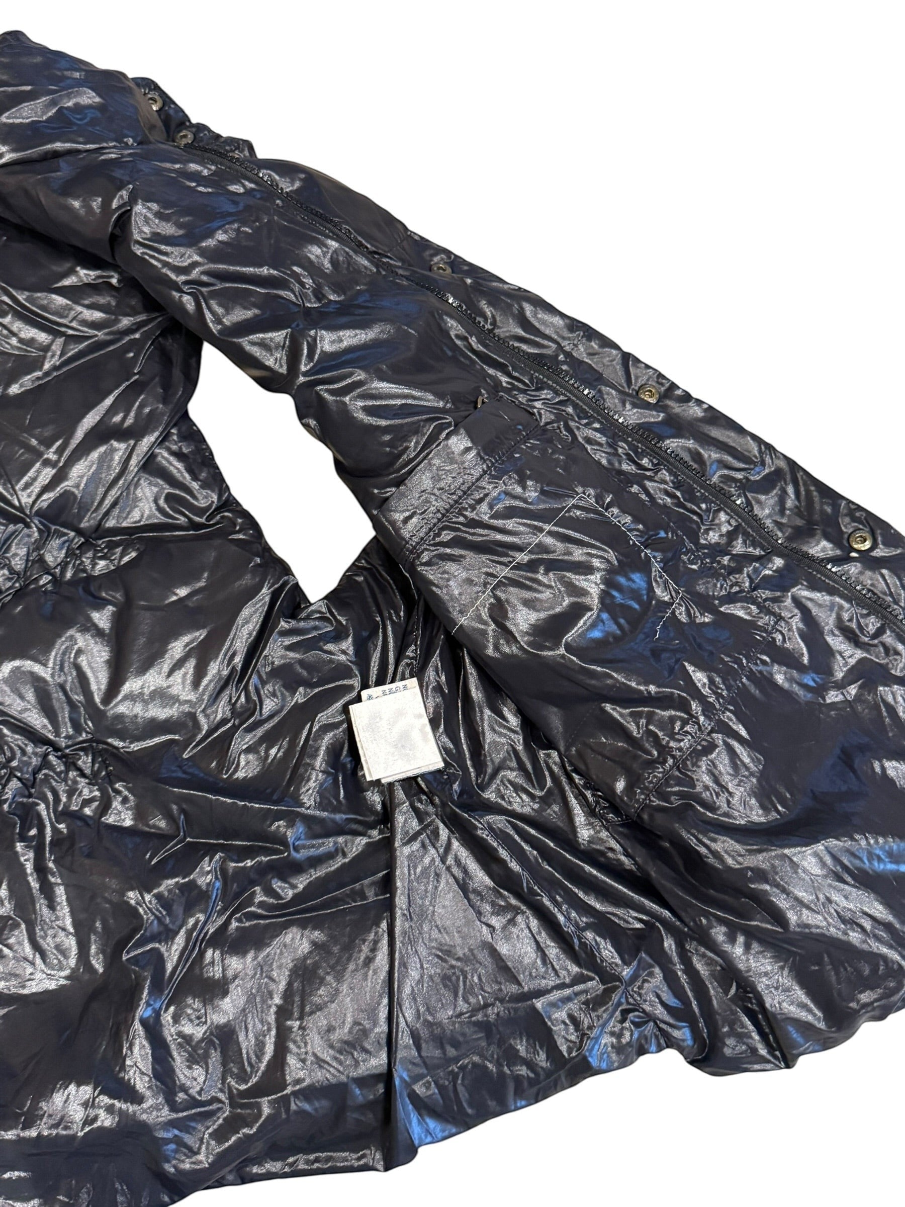 Archive No. 9 Moncler black down-filled gilet, size XL. Sleeveless, lightweight, and insulated for warmth.