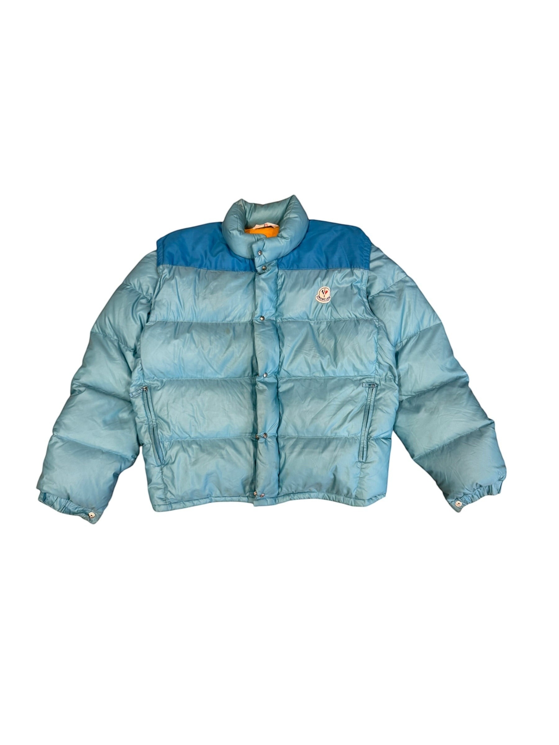 Archive No. 9 1990s Moncler blue down puffer jacket with detachable sleeves and contrast blue shoulders. Medium fit.
