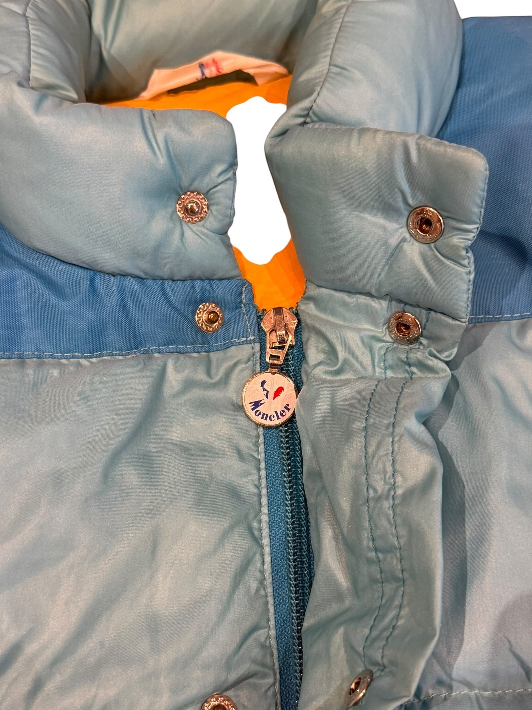 Archive No. 9 Moncler vintage blue down puffer jacket with detachable sleeves and orange lining. Medium fit.