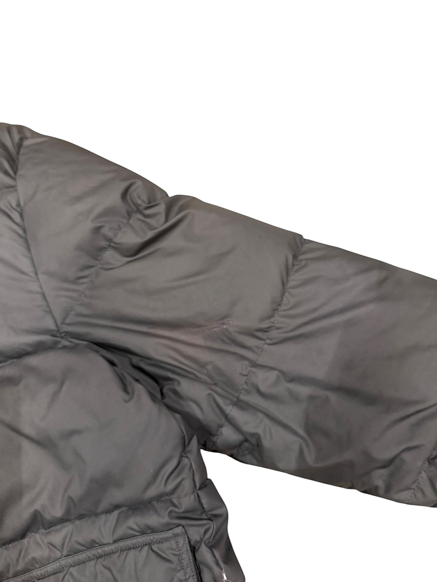 Archive No. 9 vintage grey Moncler Grenoble down puffer jacket with a small burn mark on the arm. Size XL.