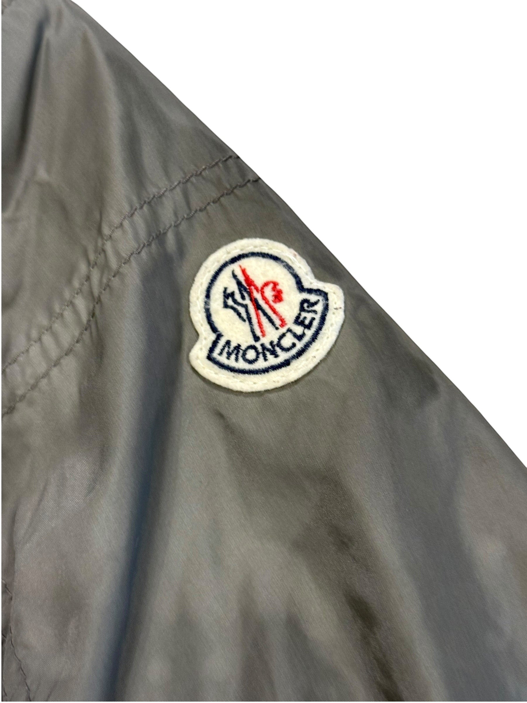 Archive No. 9 Moncler grey lightweight waterproof utility jacket, size L, with signature logo patch.