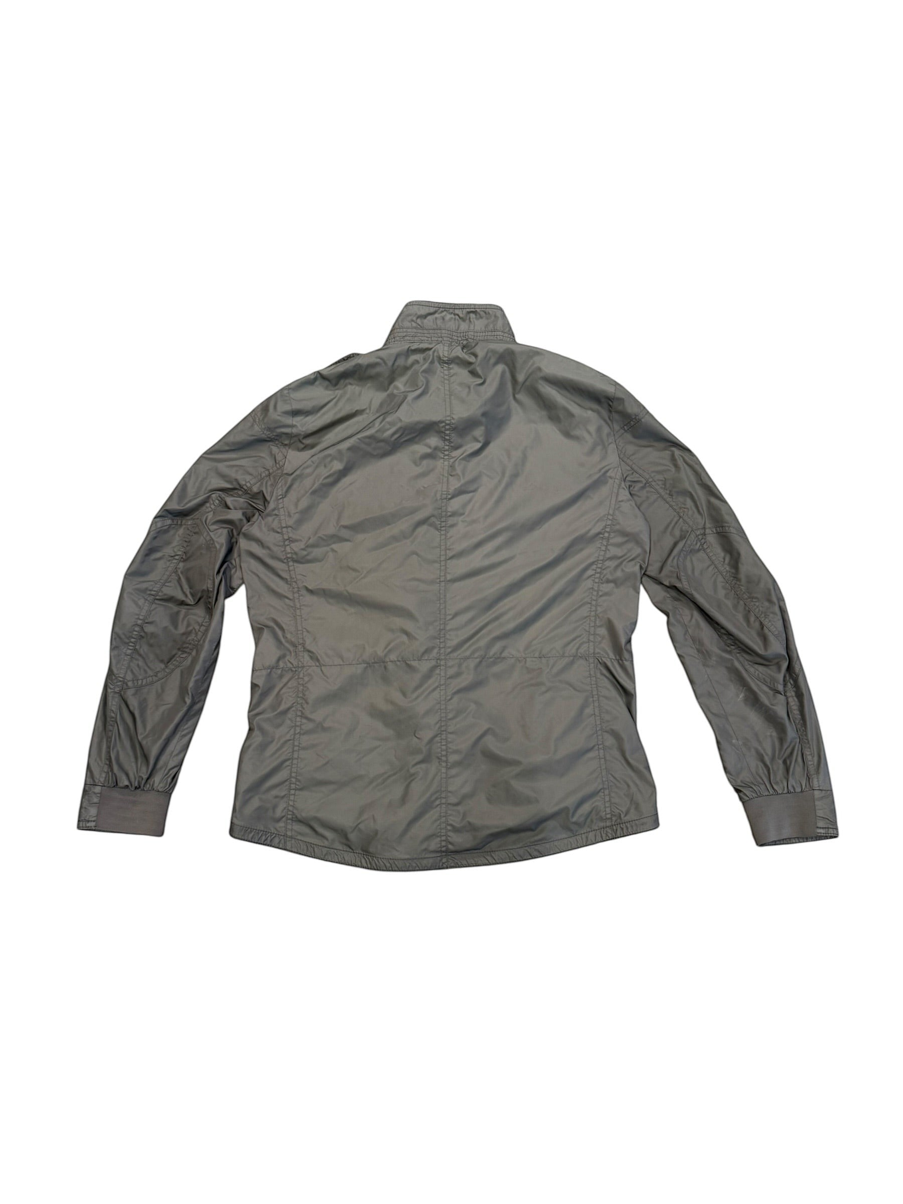 Archive No. 9 grey lightweight waterproof Moncler utility jacket, size L, with subtle marks on the arm.