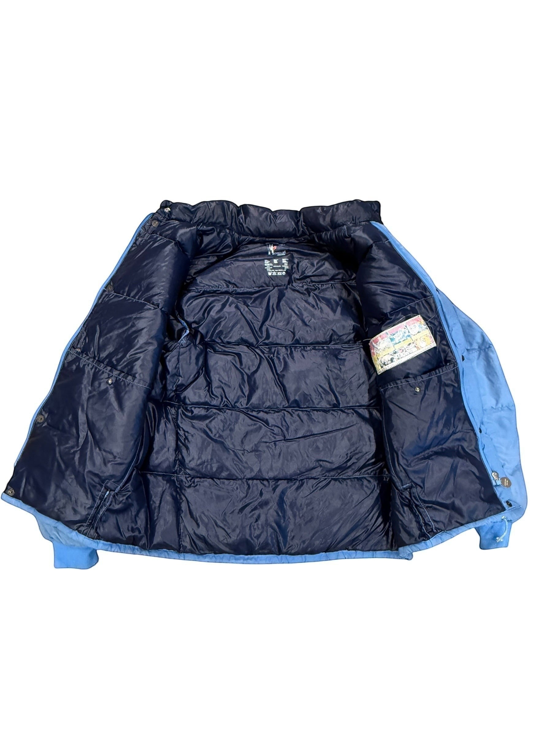 Archive No. 9 vintage light blue Moncler down puffer jacket, size Large. Down-filled for warmth.