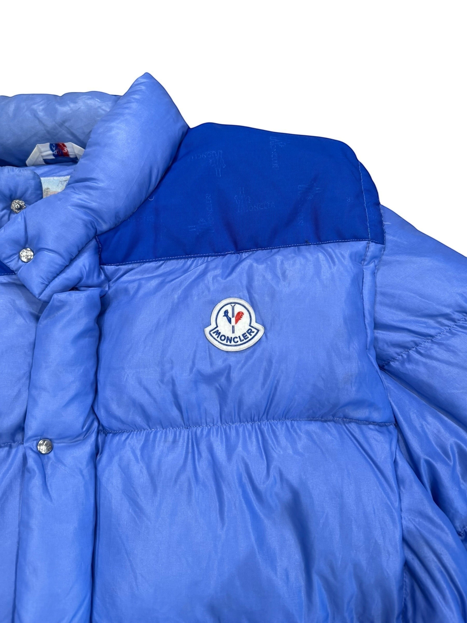 Archive No. 9 vintage blue Moncler down-filled puffer jacket with contrasting blue collar and iconic logo patch.