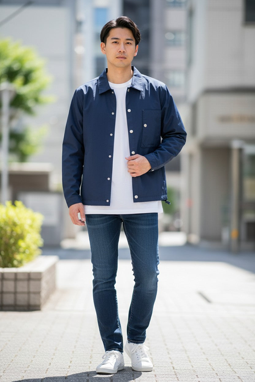 Archive No. 9 navy blue C.P. Company shell overshirt jacket for kids, size 14, with button-up front and chest pocket logo.