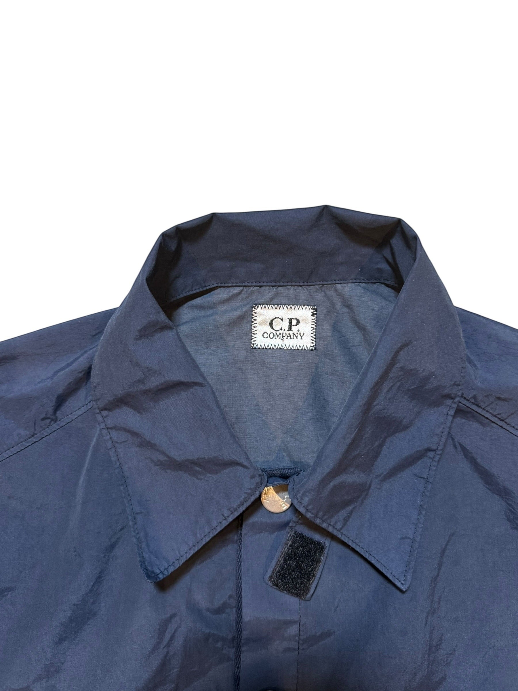 Archive No. 9 navy C.P. Company shell overshirt jacket, kids size 14, waterproof and wind-resistant with embroidered logo.