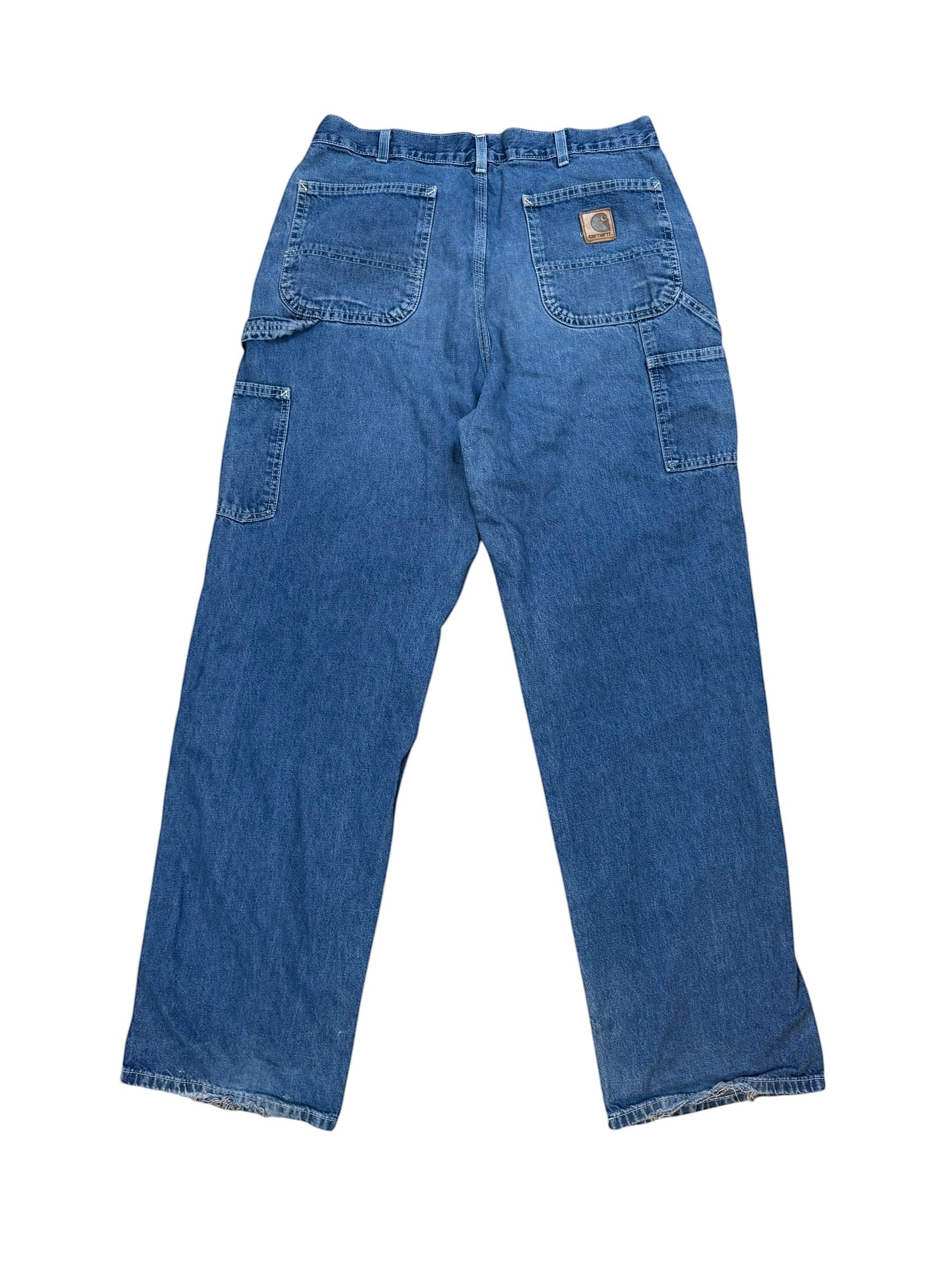 Archive No. 9 vintage navy blue denim carpenter jeans with leather patch, size W36.