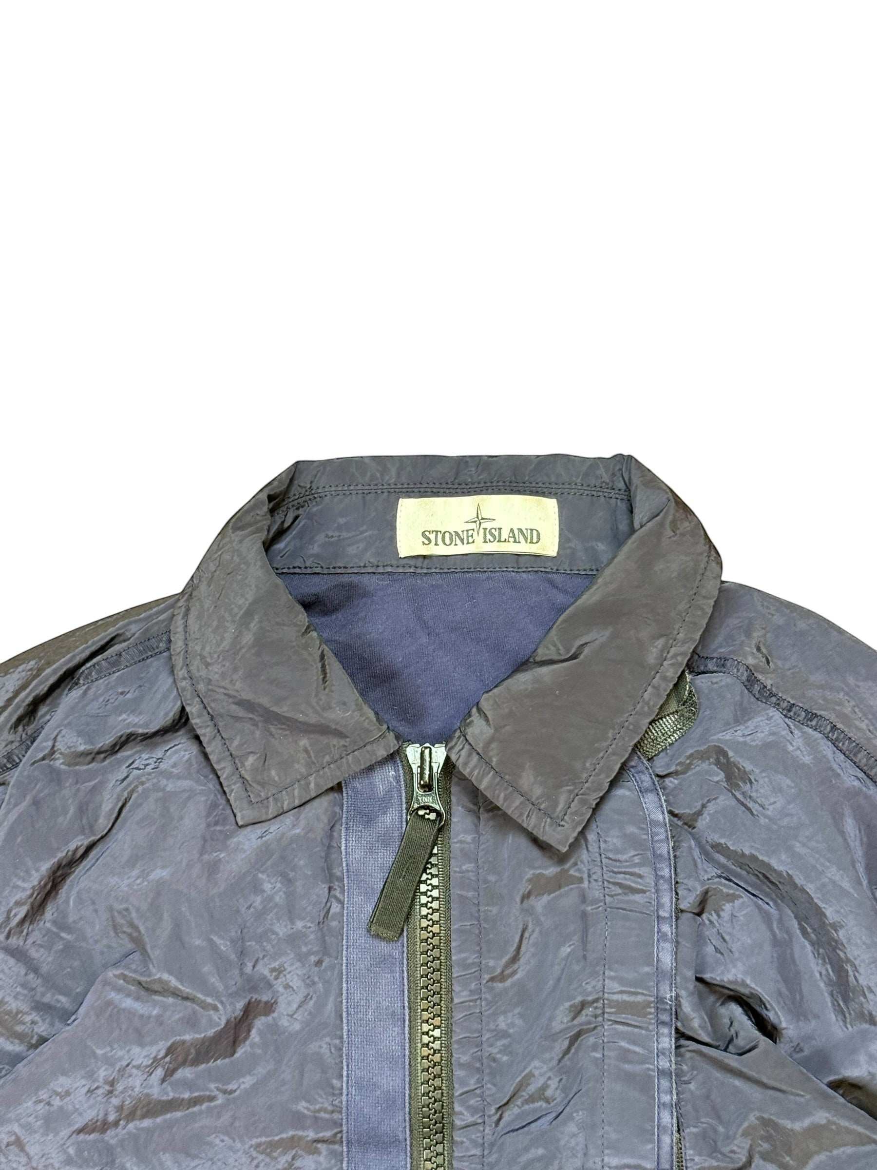 Archive No. 9 navy Stone Island nylon metal jacket, size M, with a zip closure and the brand's signature logo on the collar.