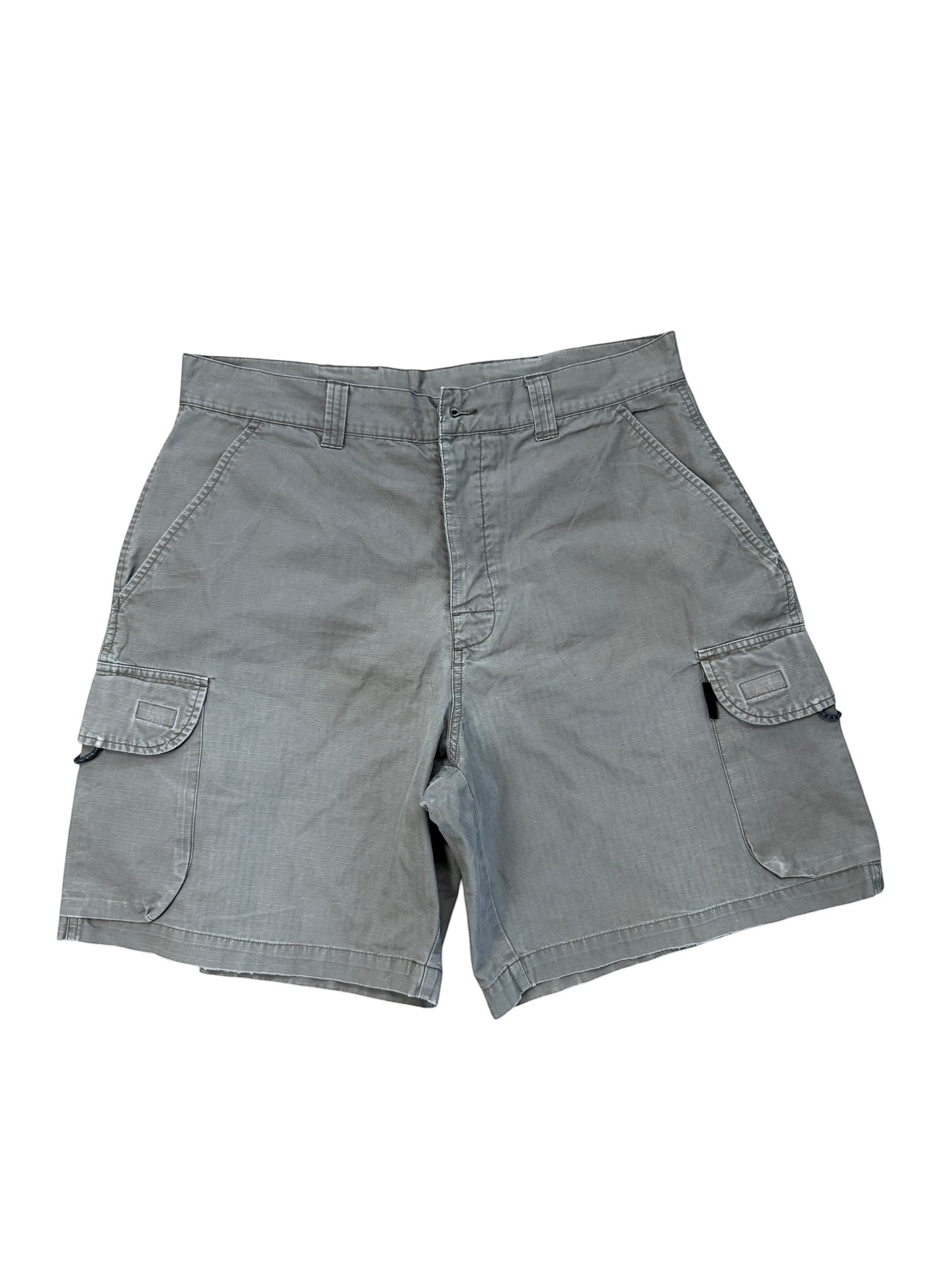 Archive No. 9 grey Nike ACG technical cargo shorts with multiple pockets and waterproof material.