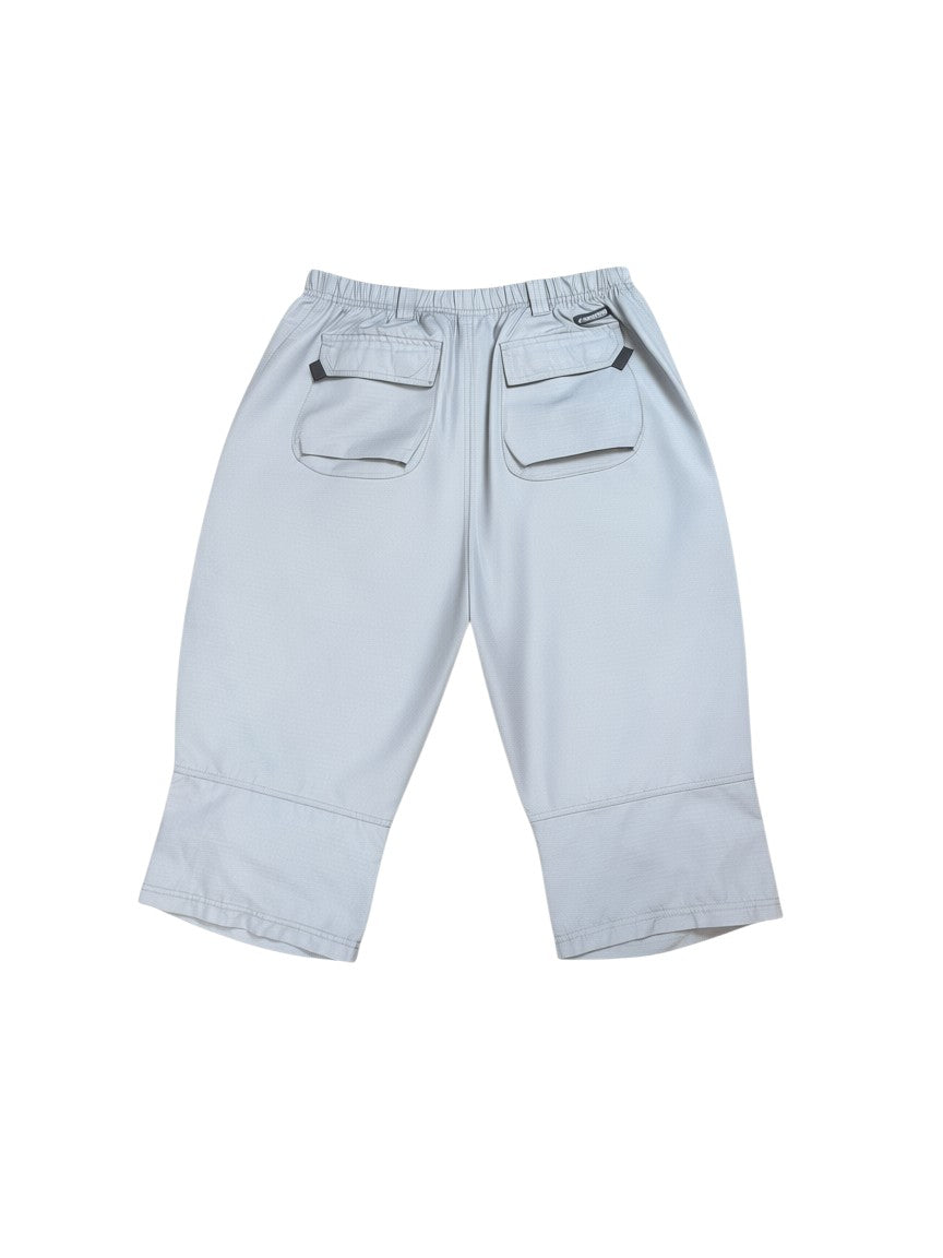 Archive No. 9 vintage grey Nike ACG technical shorts, waterproof and wind resistant, size XL, with multiple cargo pockets.