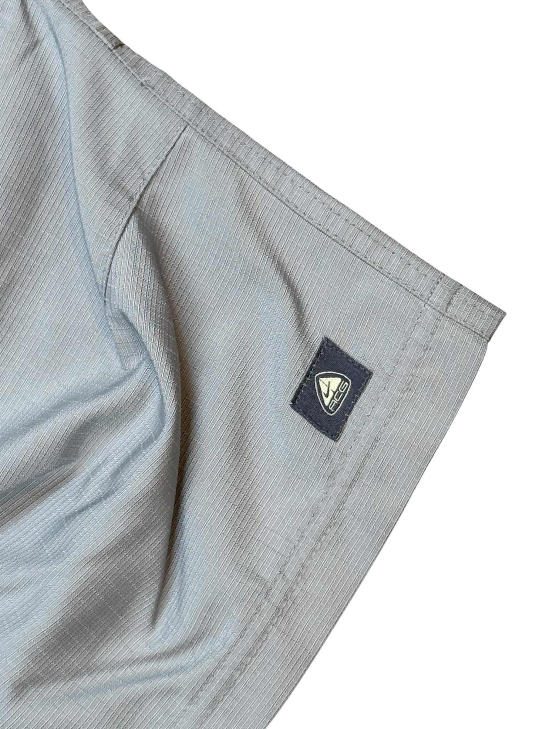 Archive No. 9 vintage grey Nike ACG technical shorts, waterproof and wind-resistant, size XL.