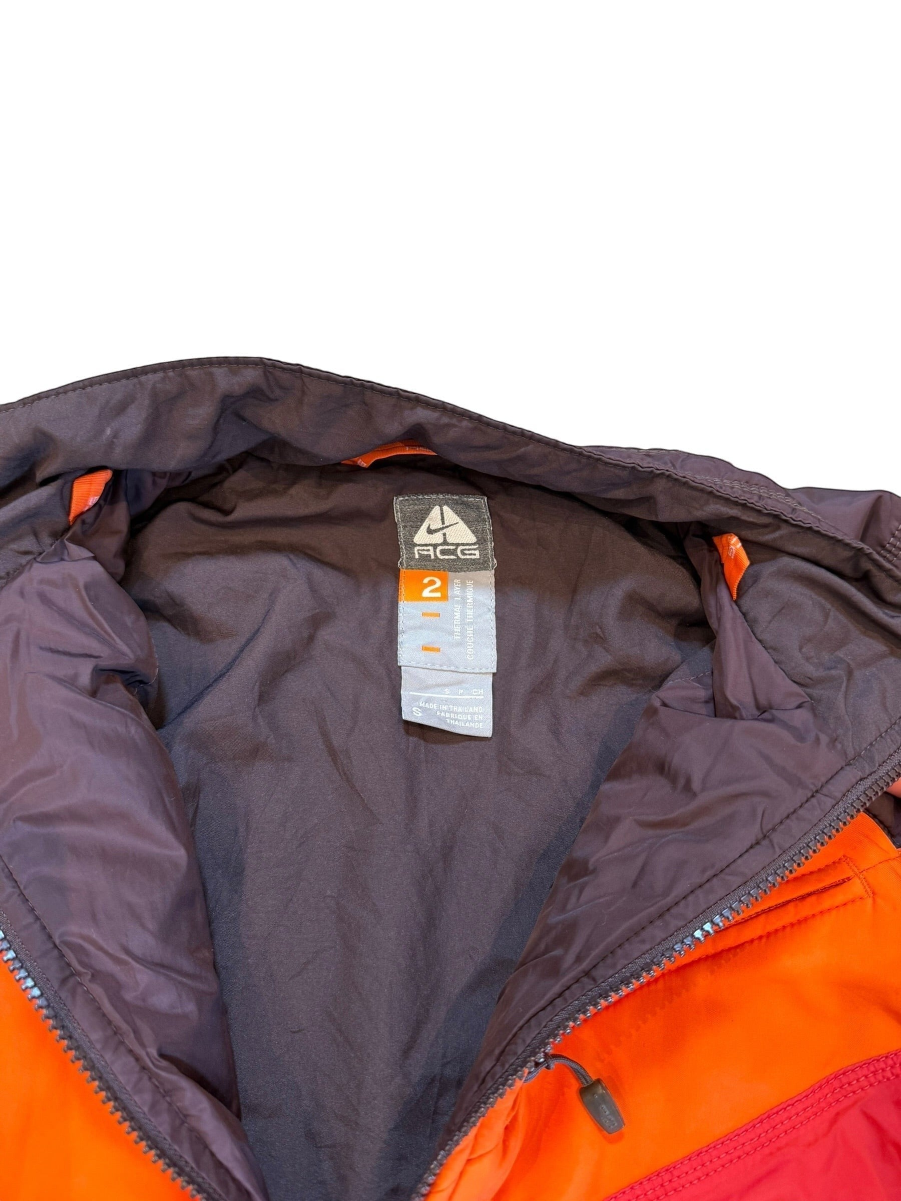 Archive No. 9 Nike ACG orange and red down puffer jacket, size Small. Wind and water-resistant.
