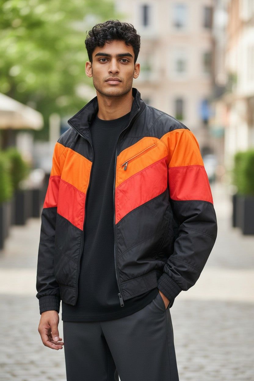 Archive No.9 Nike ACG orange and red puffer jacket with black panels, size Small. Down filled, wind and water-resistant.